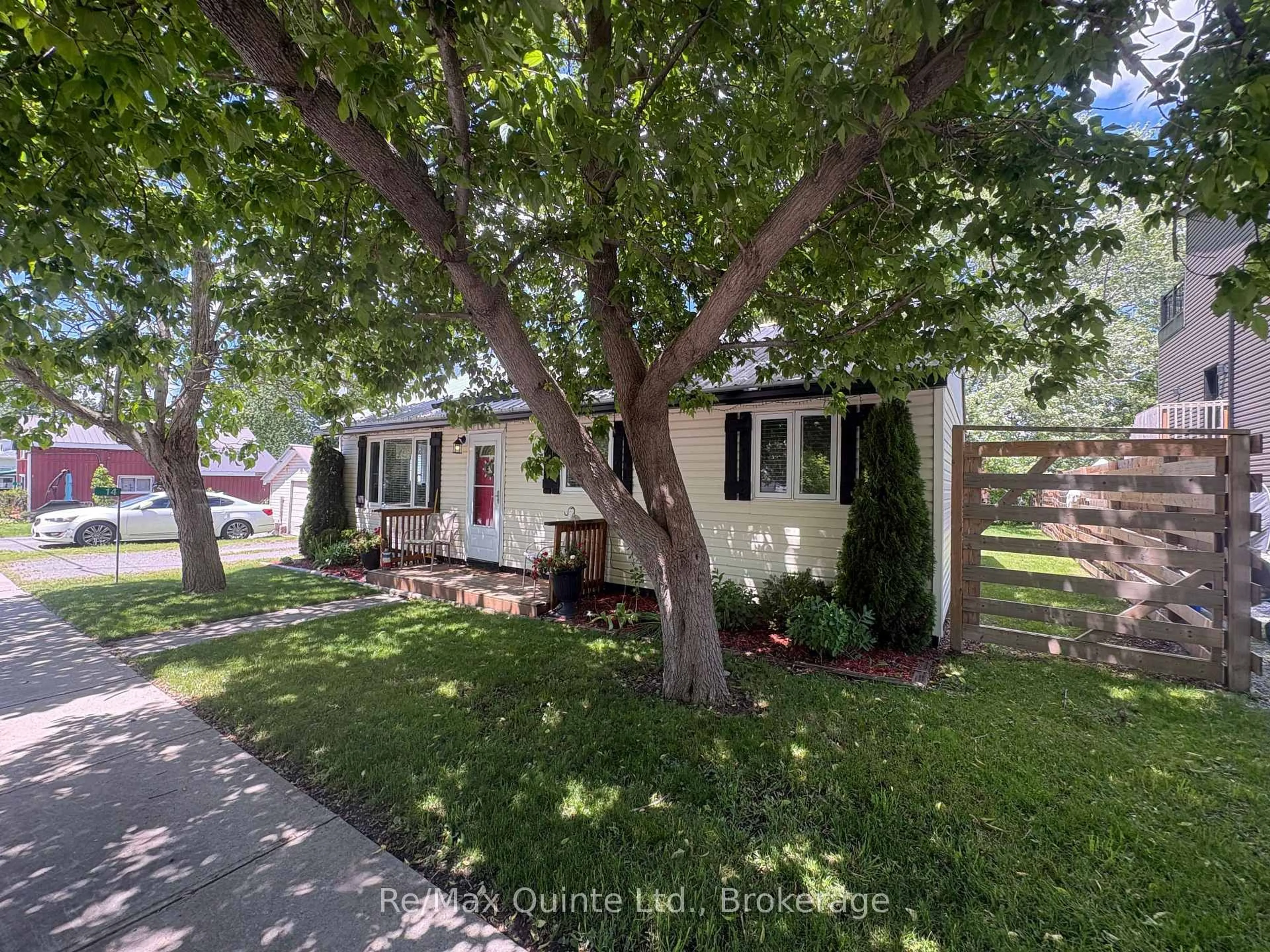 A pic from outside/outdoor area/front of a property/back of a property/a pic from drone, street for 14 Bay Ave, Prince Edward County Ontario K0K 1T0