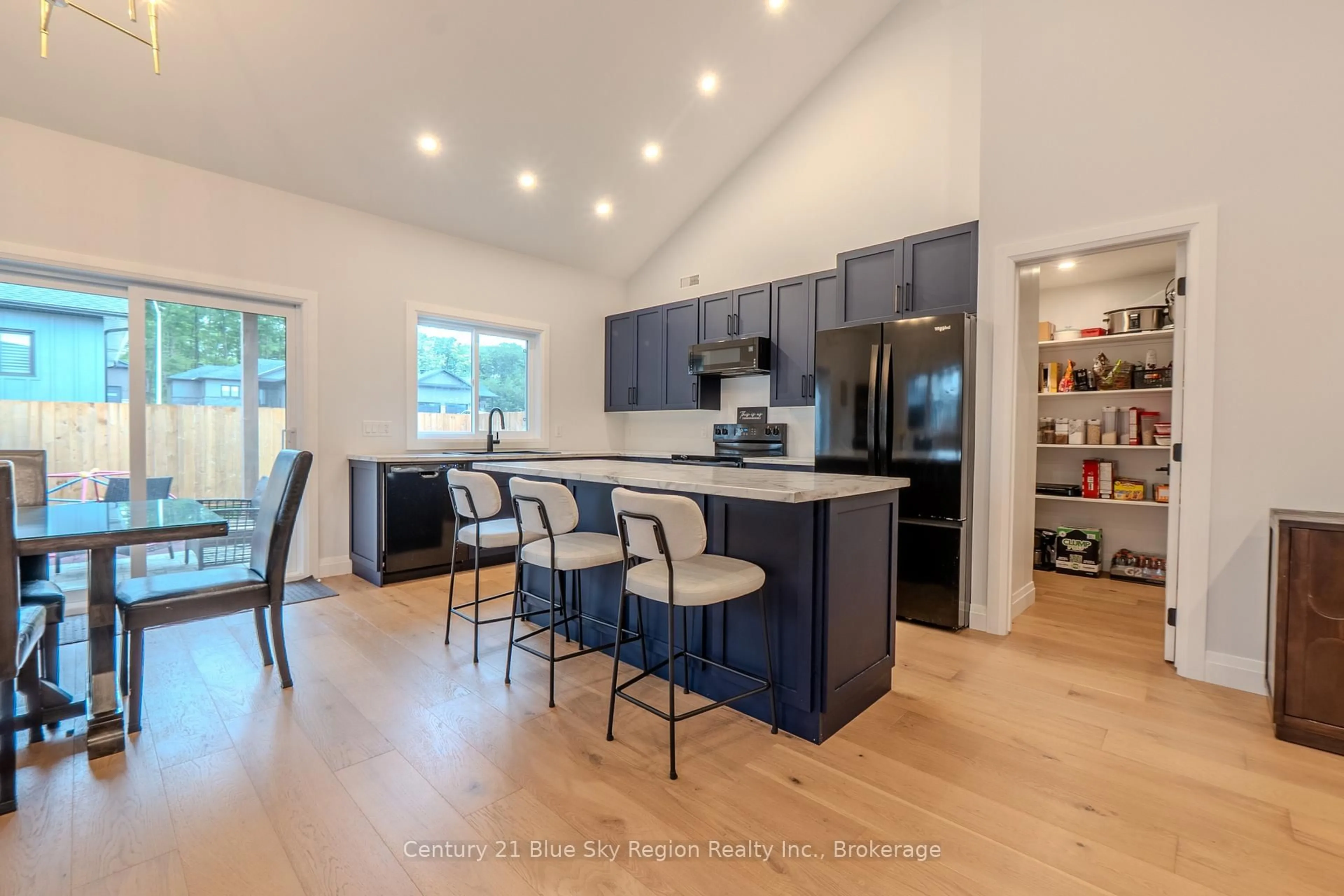 Open concept kitchen, wood/laminate floor for 178 Carmichael Dr, North Bay Ontario P1B 8G2