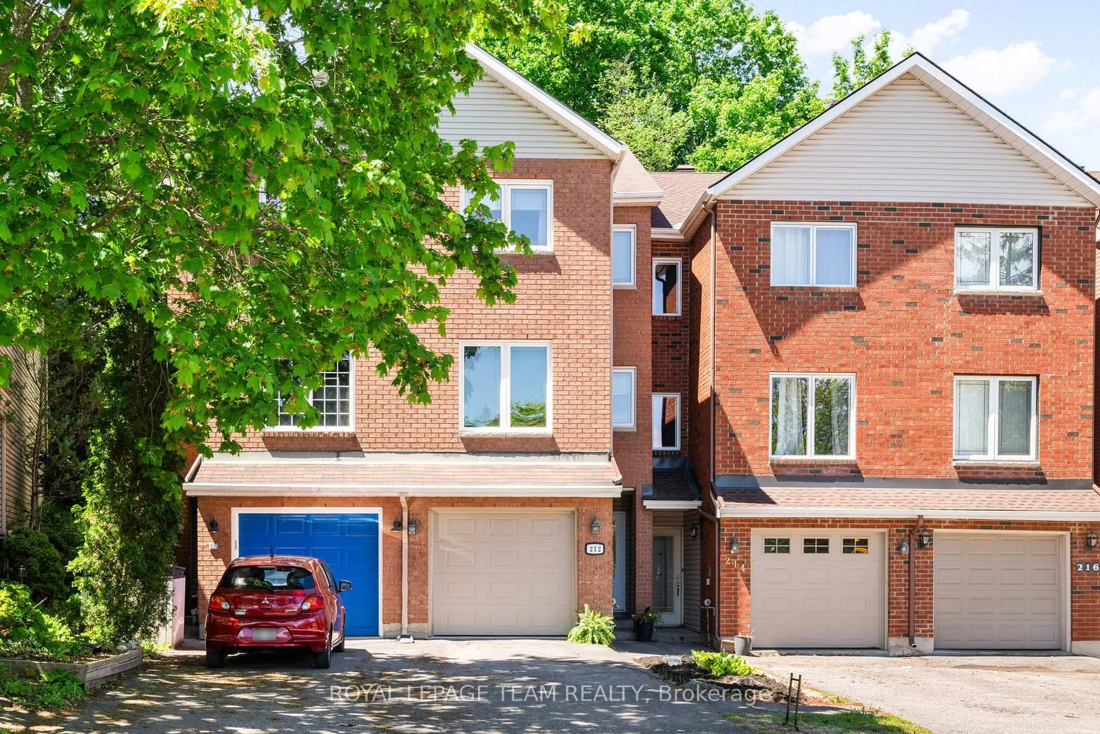 Home with brick exterior material, street for 212 Provender Ave, Ottawa Ontario K1K 4N7
