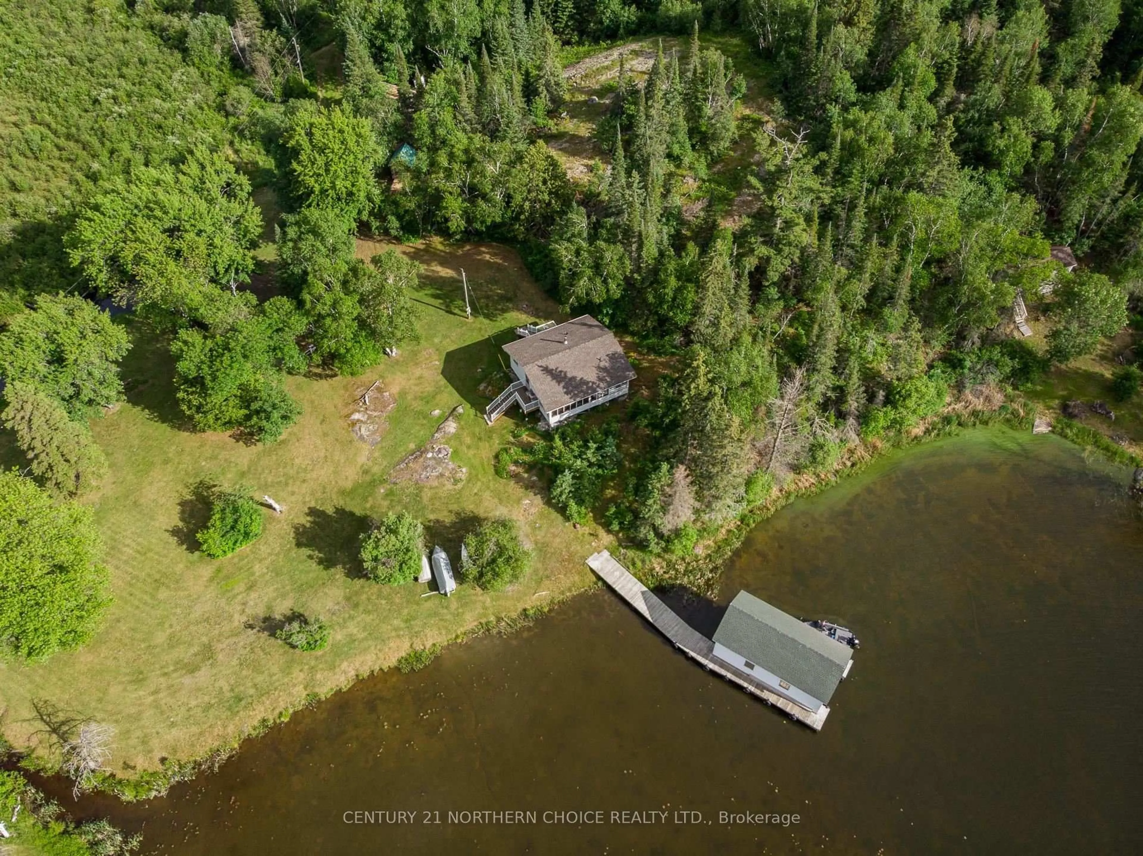 A pic from outside/outdoor area/front of a property/back of a property/a pic from drone, water/lake/river/ocean view for 440 Coney Island, Kenora Ontario P9N 3X4