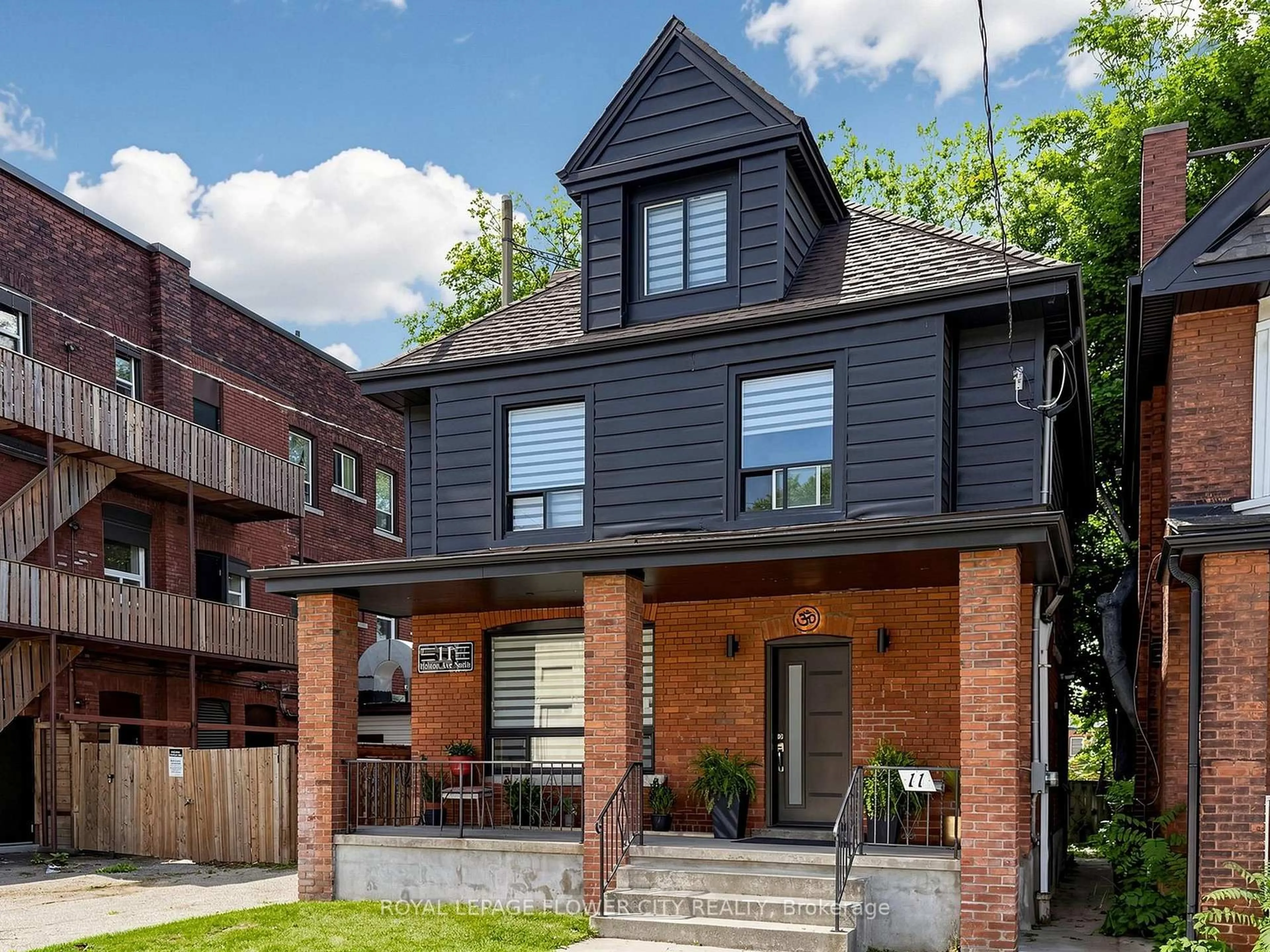 Home with brick exterior material, street for 11 Holton Ave, Hamilton Ontario L8L 6H3