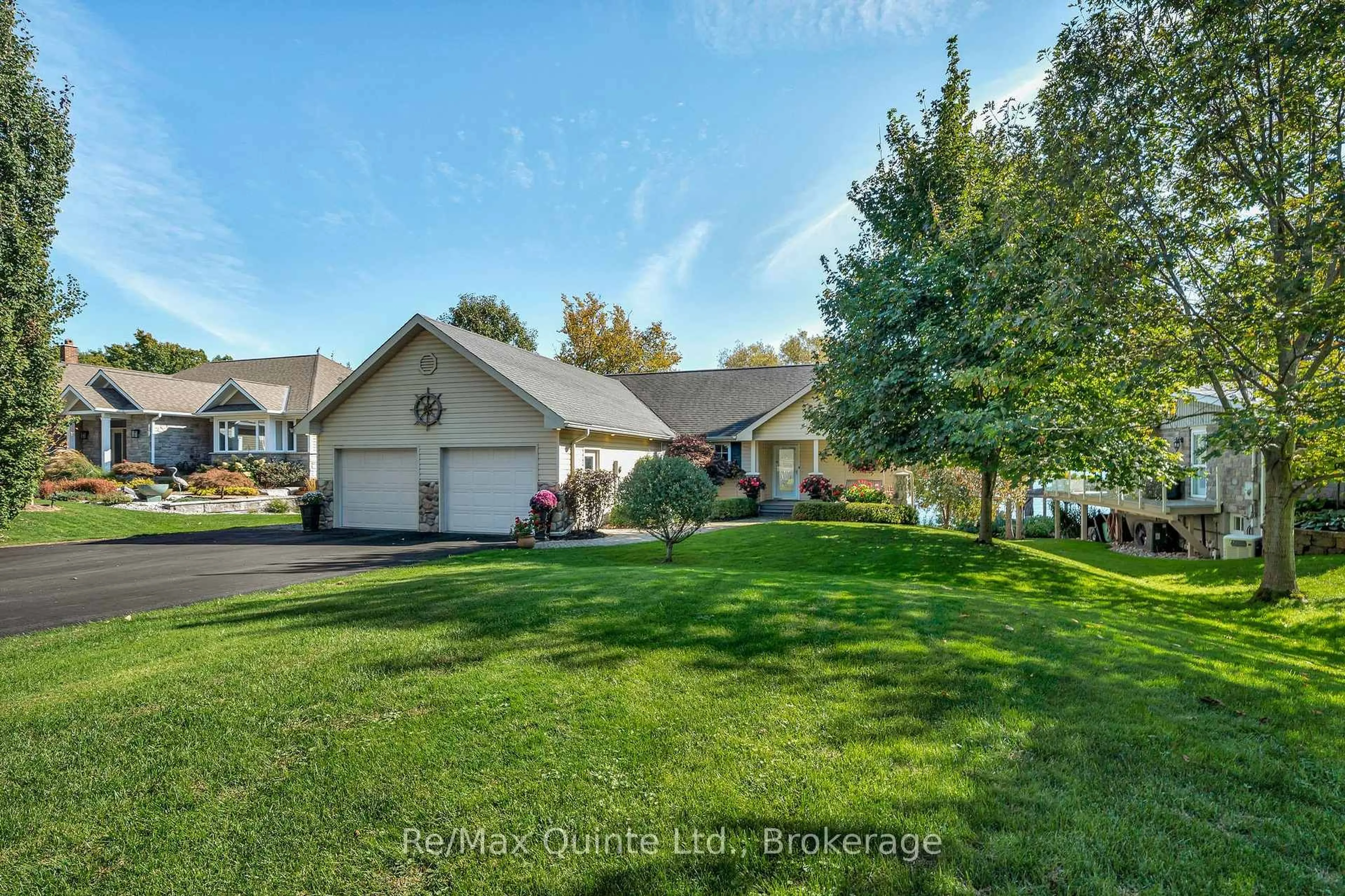 A pic from outside/outdoor area/front of a property/back of a property/a pic from drone, unknown for 524 Island Rd, Prince Edward County Ontario K0K 2T0
