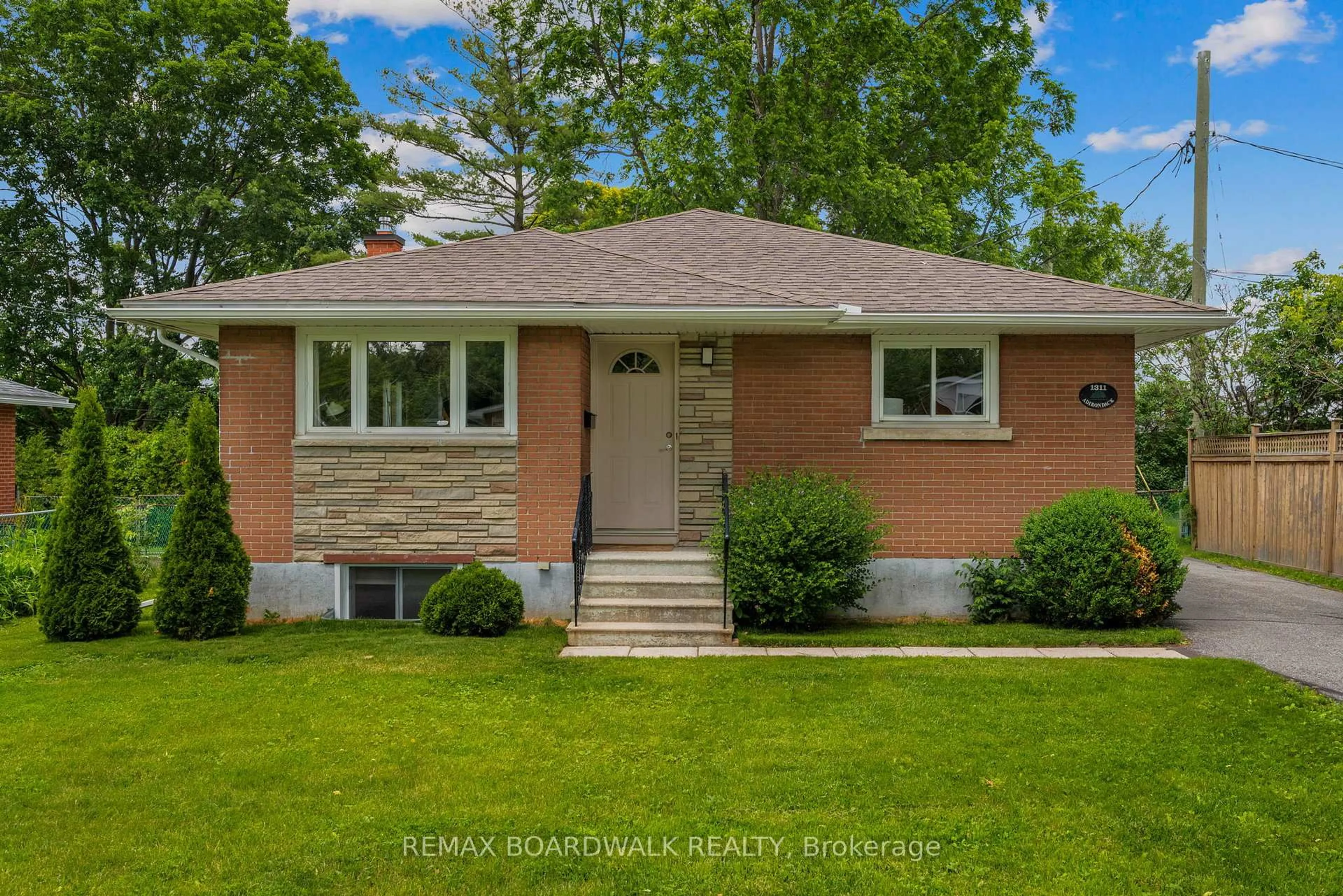 Home with brick exterior material, street for 1311 Adirondack Dr, Ottawa Ontario K2C 2V7