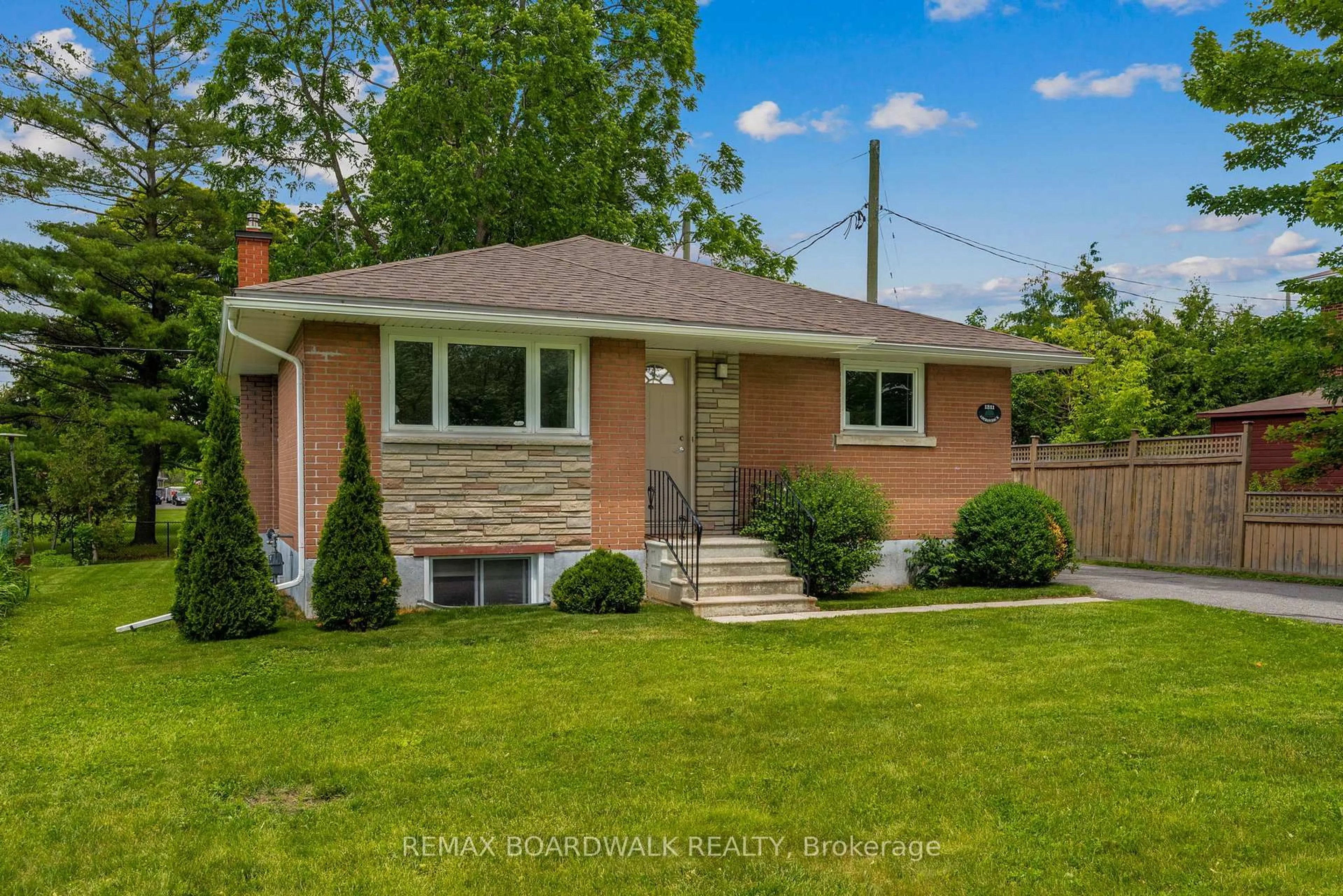 Home with brick exterior material, street for 1311 Adirondack Dr, Ottawa Ontario K2C 2V7