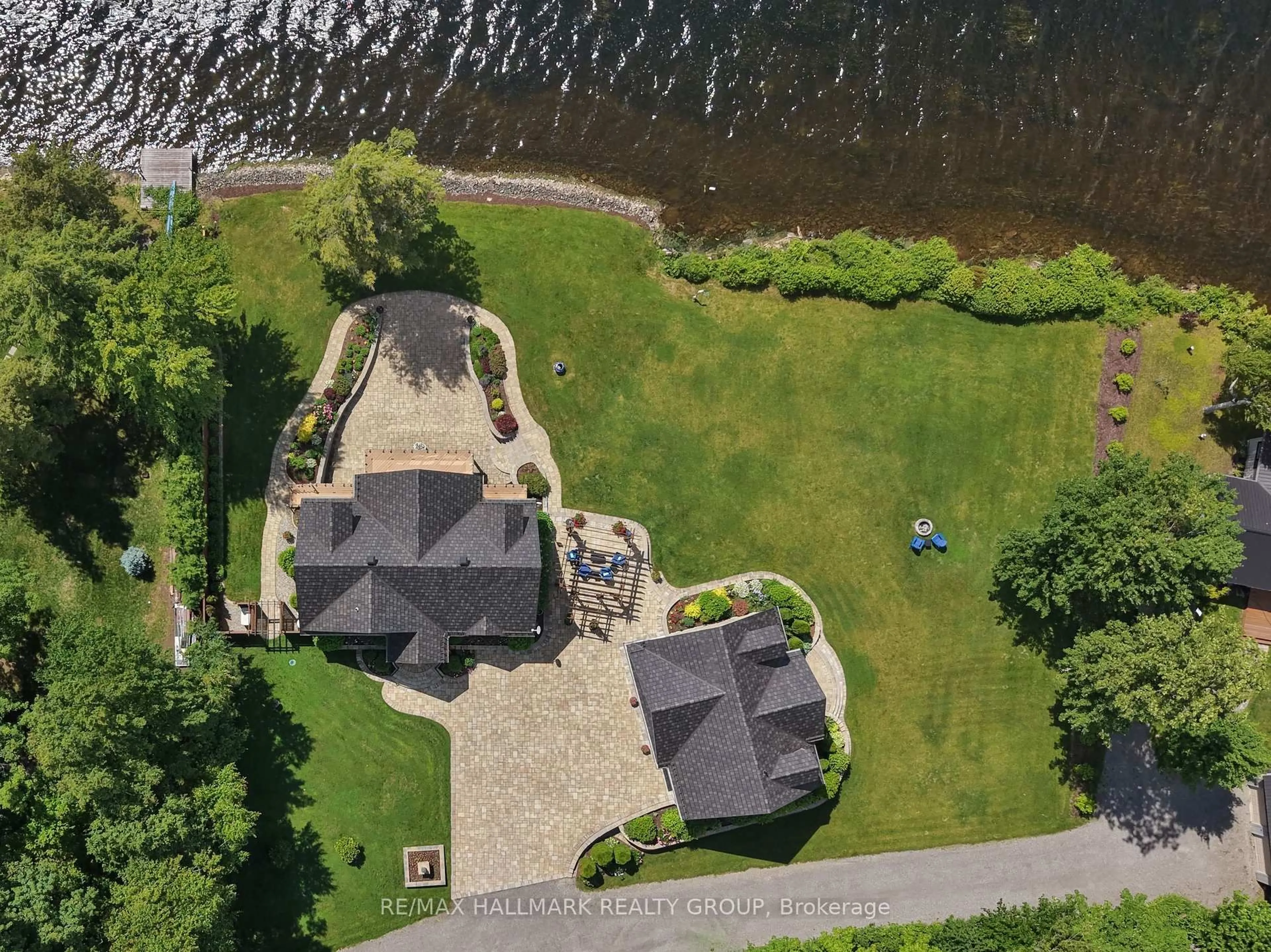 A pic from outside/outdoor area/front of a property/back of a property/a pic from drone, water/lake/river/ocean view for 6 R1 Rd, Rideau Lakes Ontario K7A 0C9