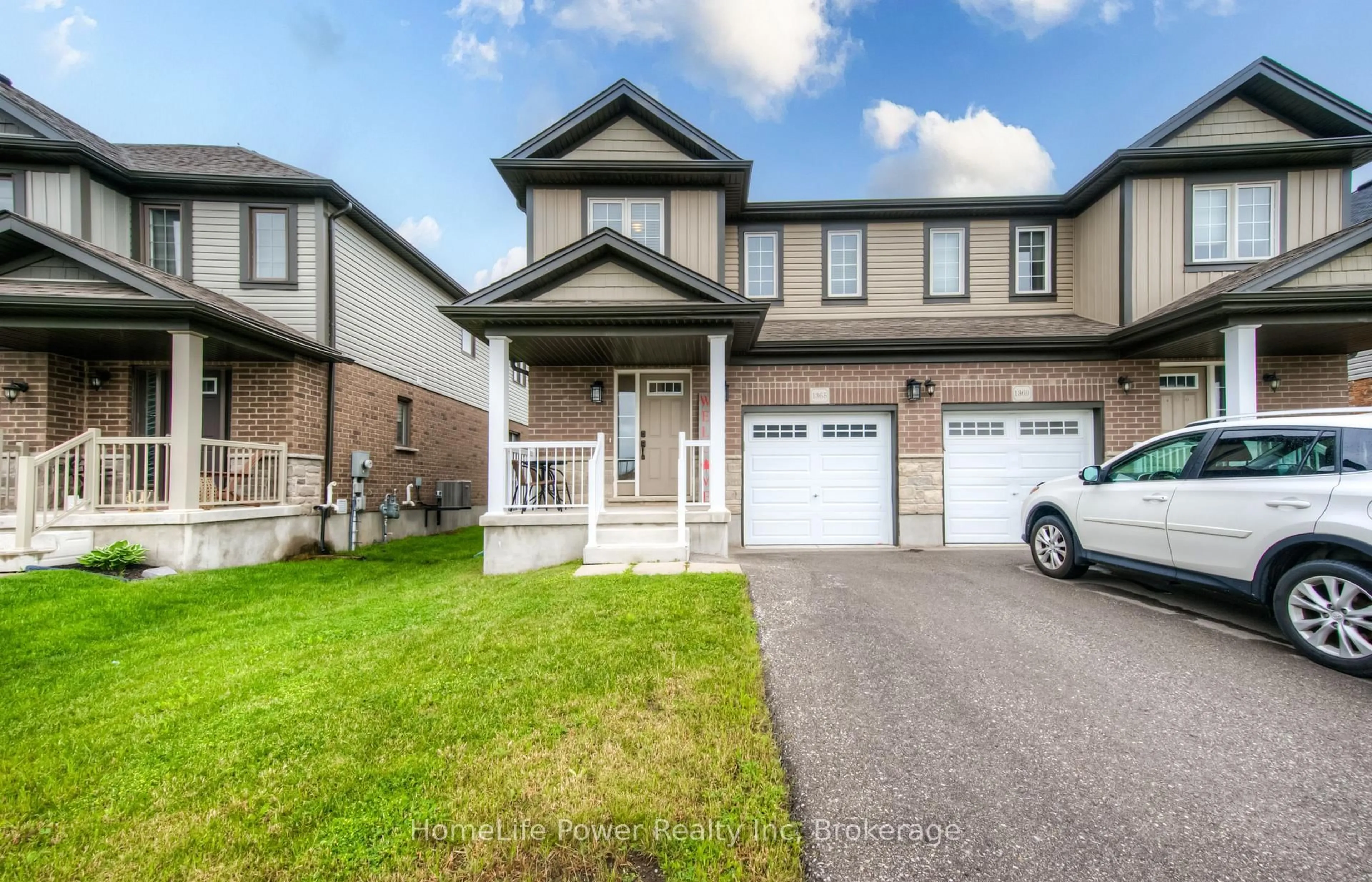 Home with vinyl exterior material, street for 1365 Calais Dr, Woodstock Ontario N4T 0L8