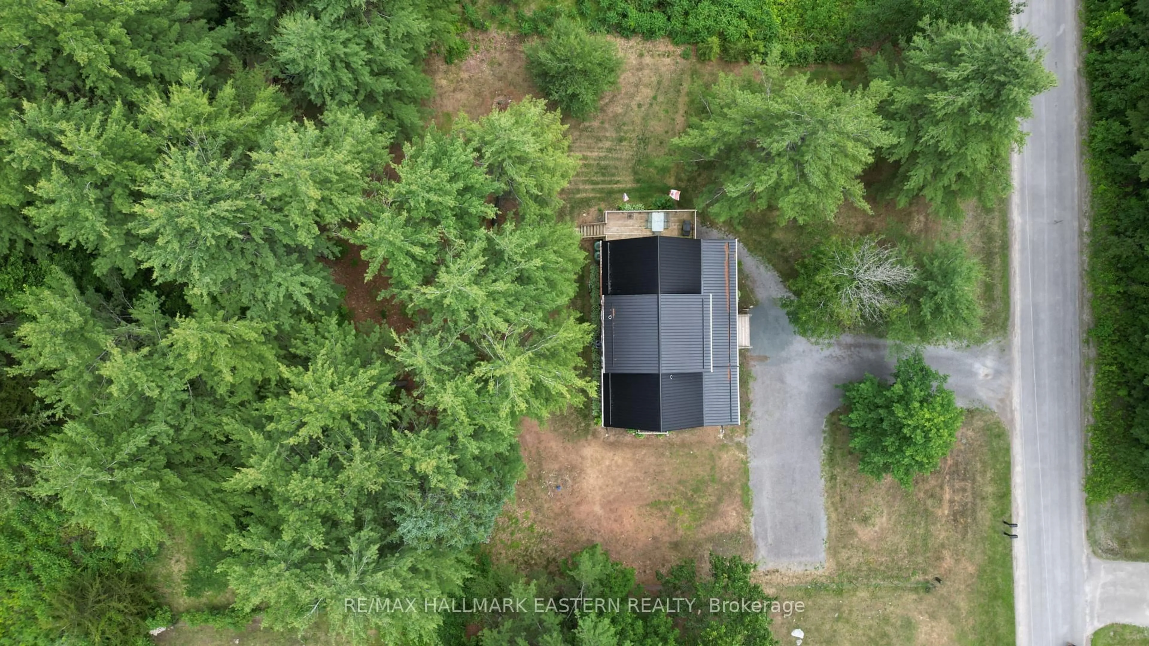 A pic from outside/outdoor area/front of a property/back of a property/a pic from drone, forest/trees view for 20 Blairton Tent & Trailer Park Rd, Havelock-Belmont-Methuen Ontario K0L 1Z0