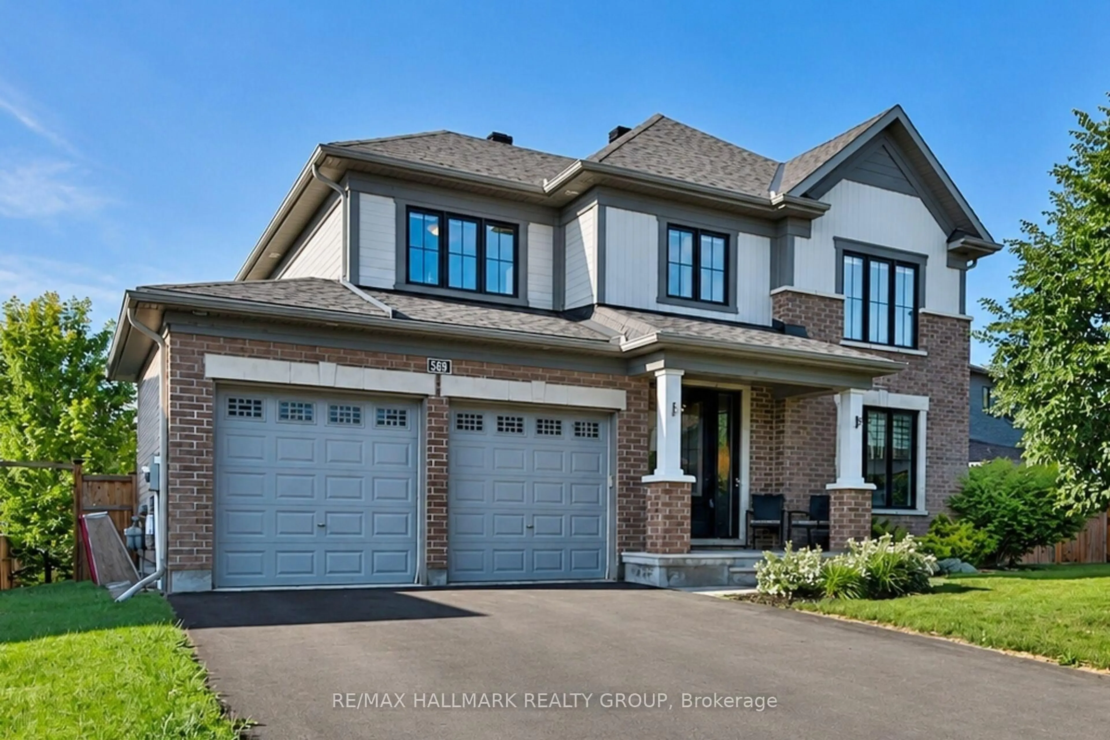 Home with brick exterior material, street for 569 Chriscraft Way, Manotick Ontario K4M 1J8