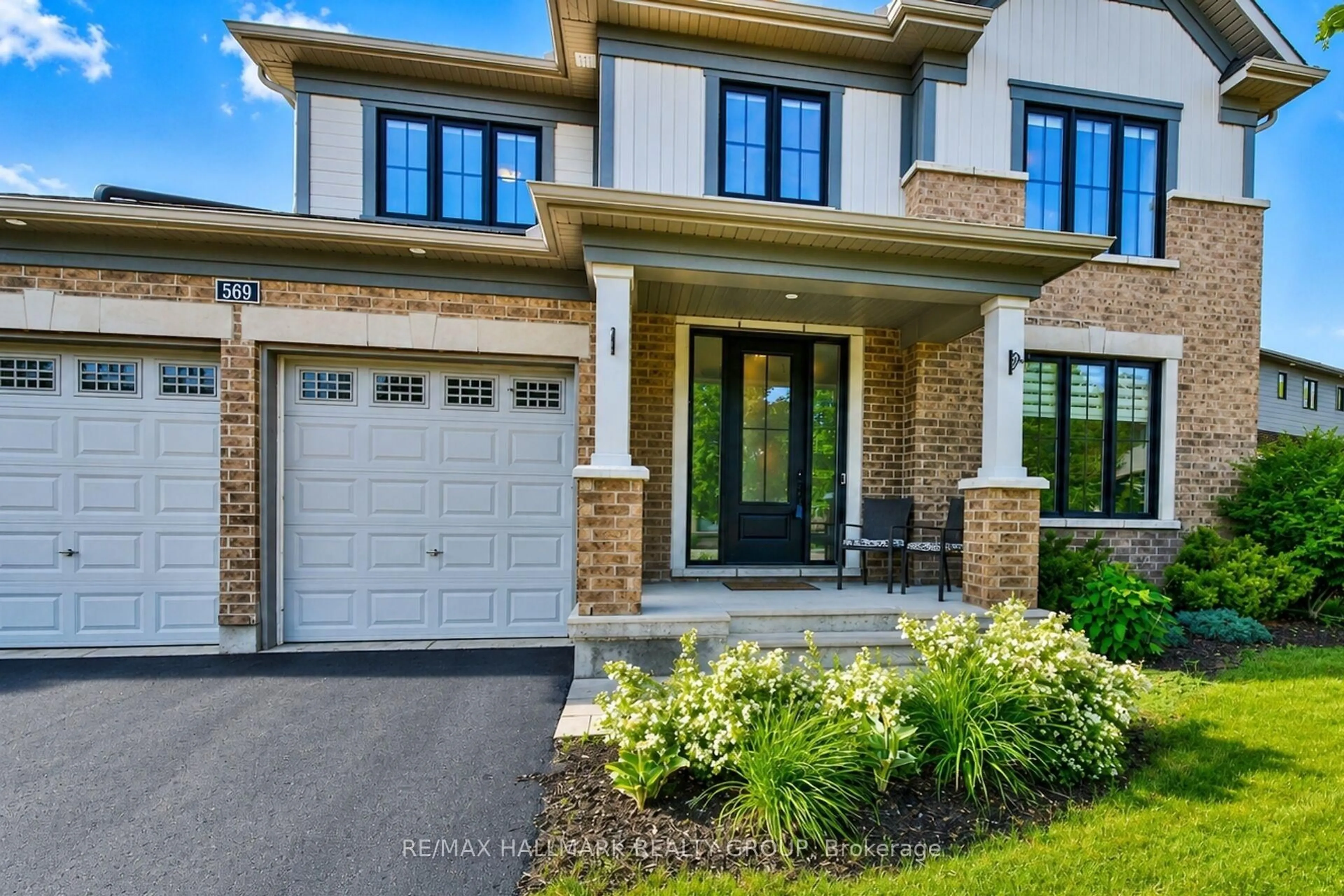 Home with brick exterior material, street for 569 Chriscraft Way, Manotick Ontario K4M 1J8