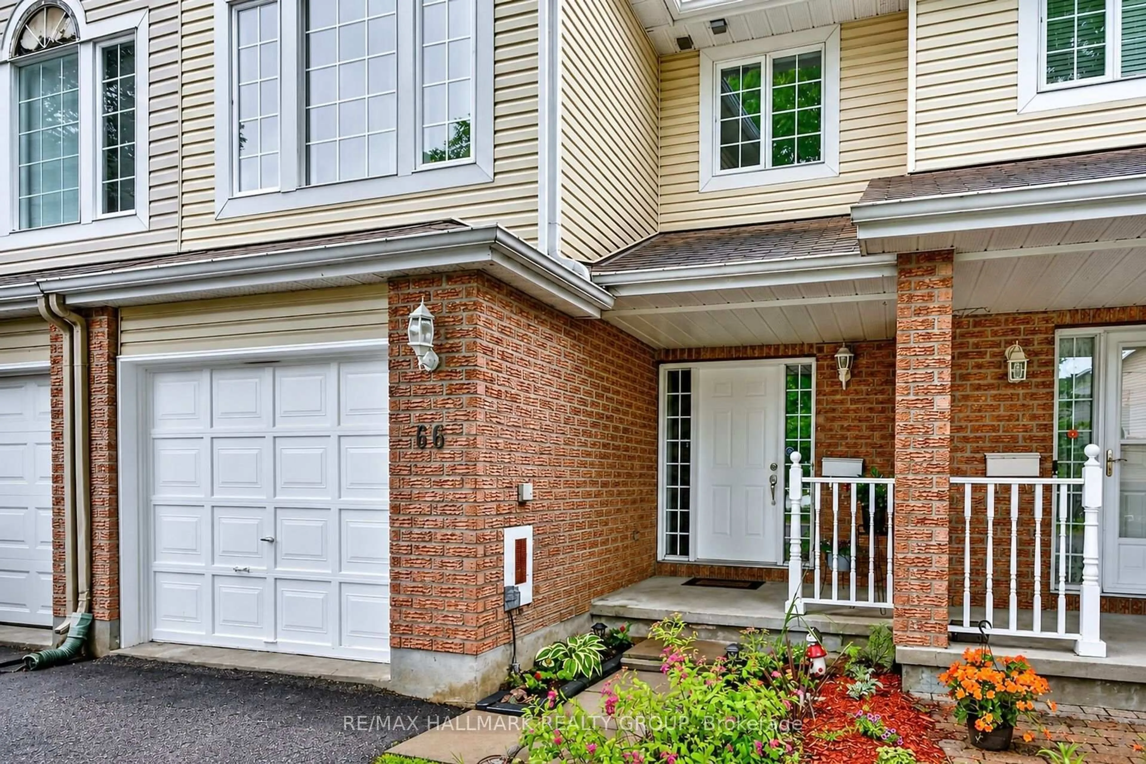 Home with brick exterior material, street for 66 Woodgate Way, Ottawa Ontario K2J 4E6
