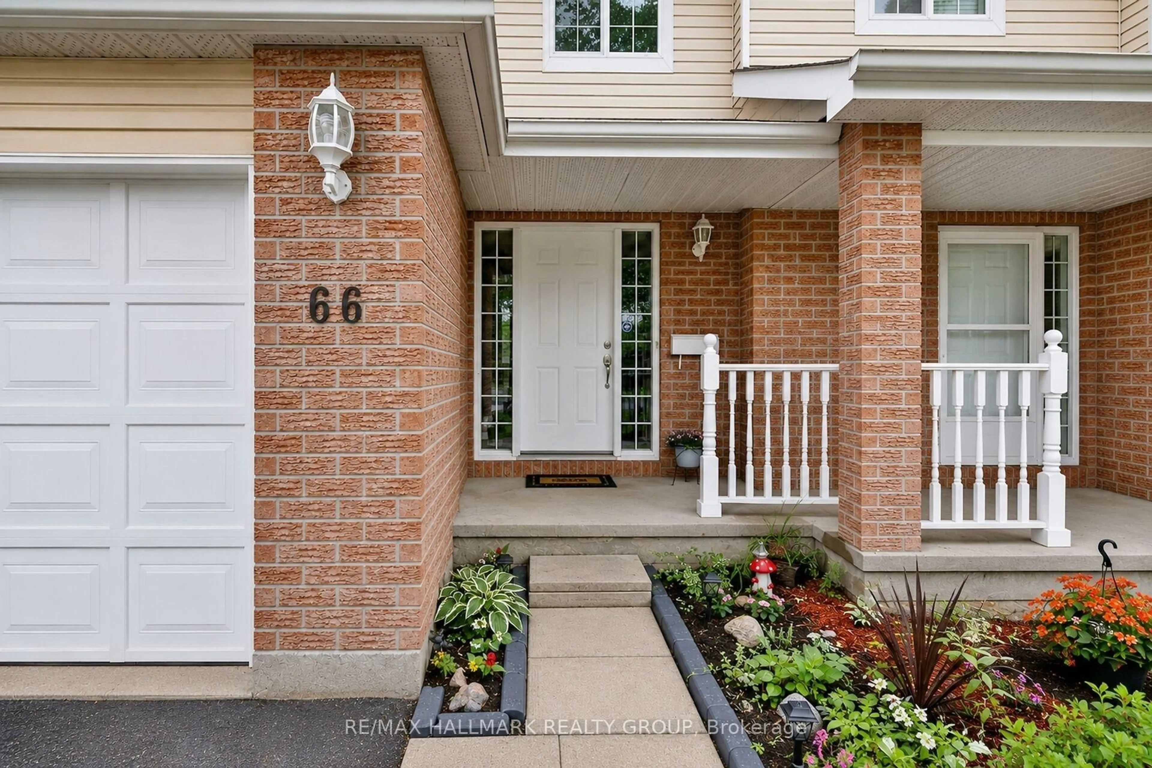 Home with brick exterior material, street for 66 Woodgate Way, Ottawa Ontario K2J 4E6