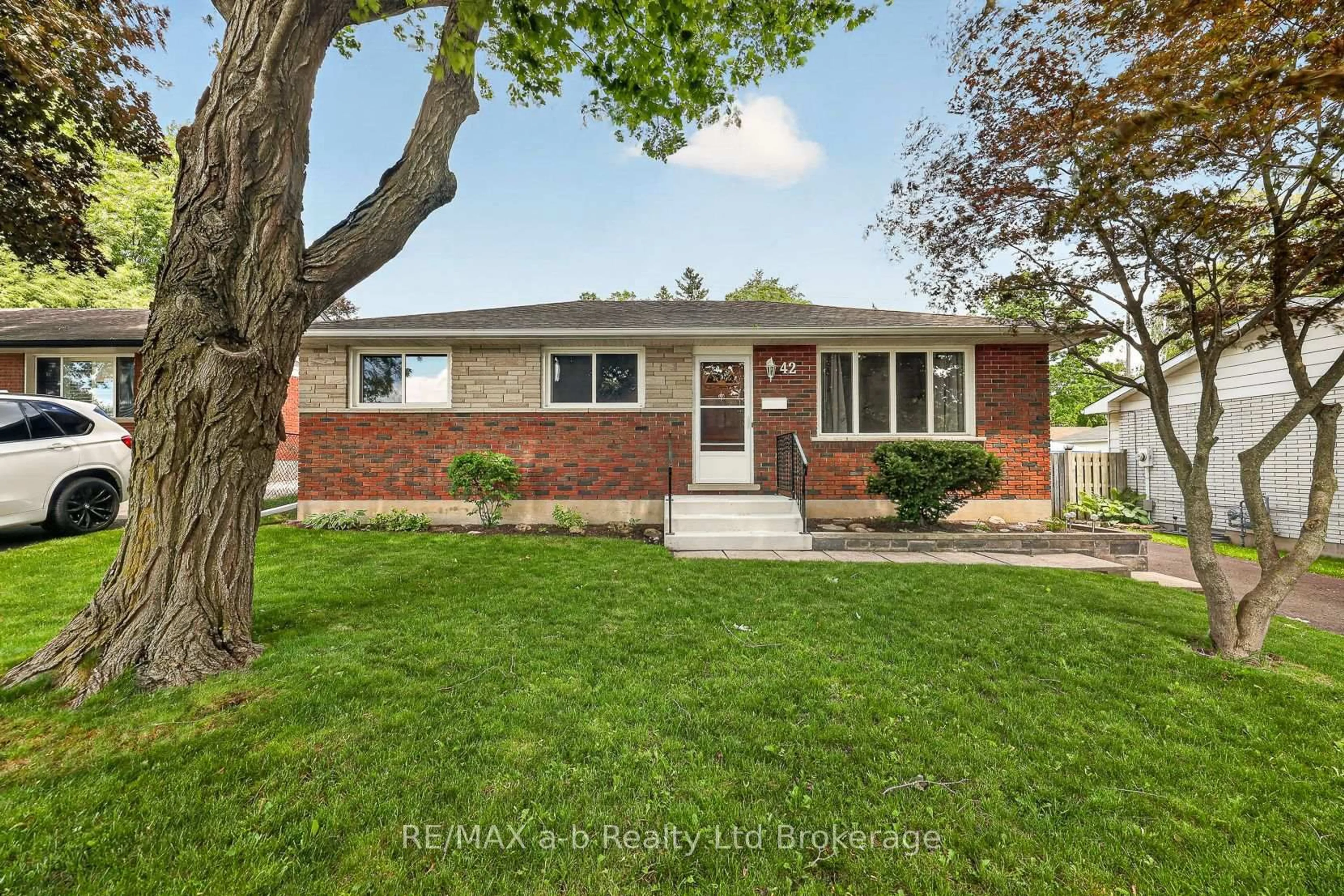 Home with brick exterior material, street for 42 Princess Park Rd, Ingersoll Ontario N5C 1X8