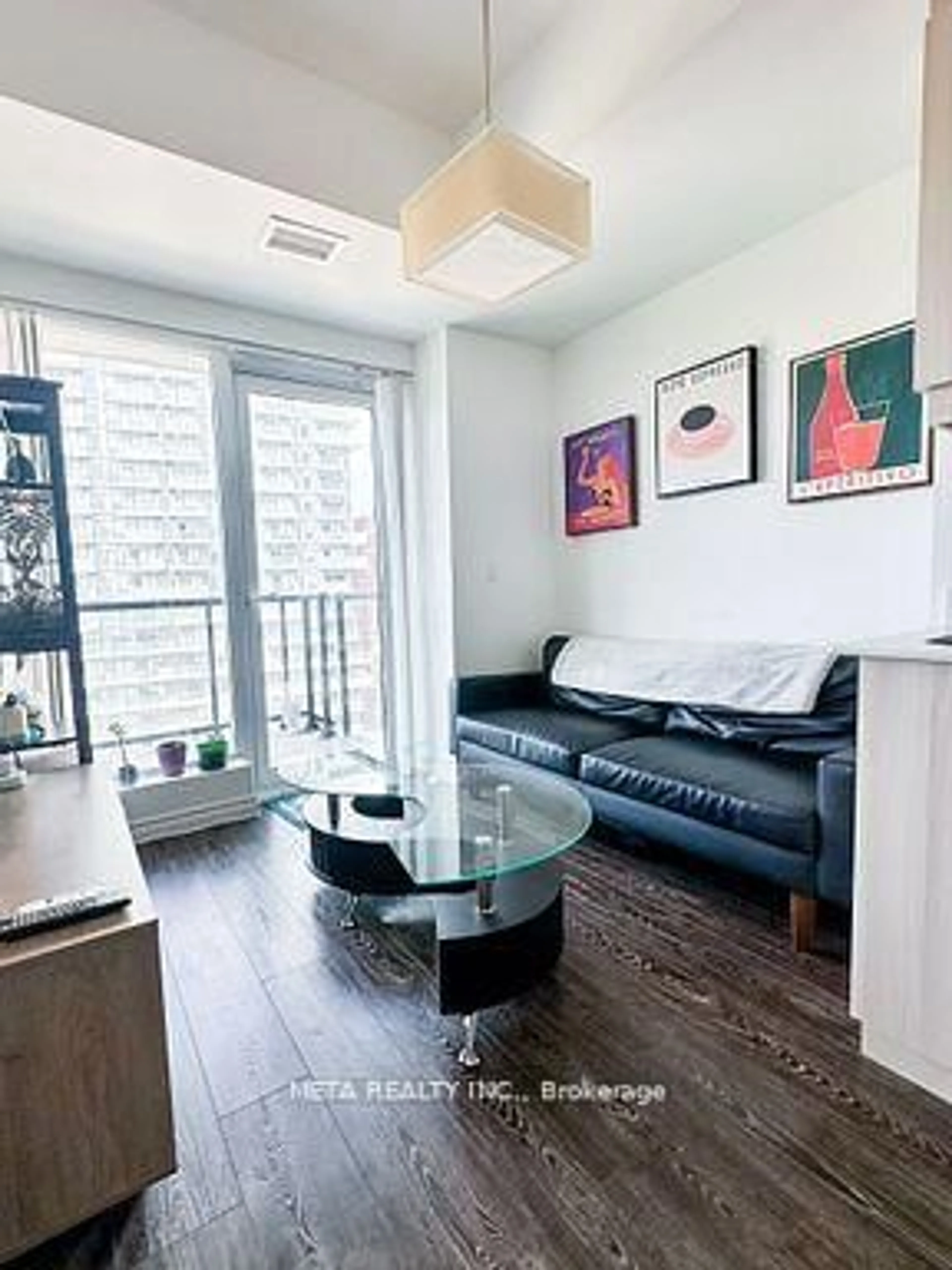 Living room with furniture, wood/laminate floor for 158 King St #1001, Waterloo Ontario N2J 0E5