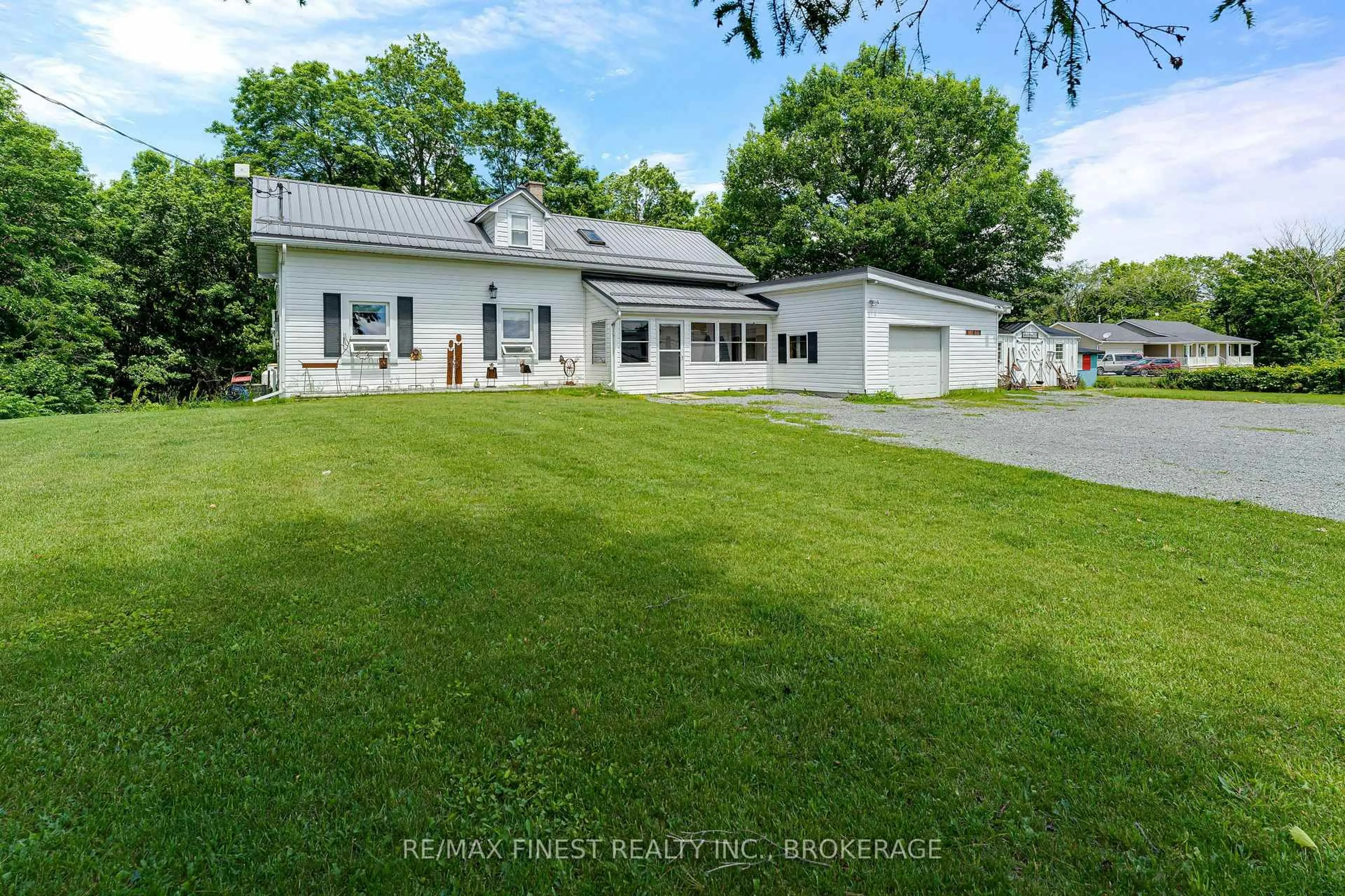 A pic from outside/outdoor area/front of a property/back of a property/a pic from drone, street for 2018 Rutledge Rd, Sydenham Ontario K0H 2T0