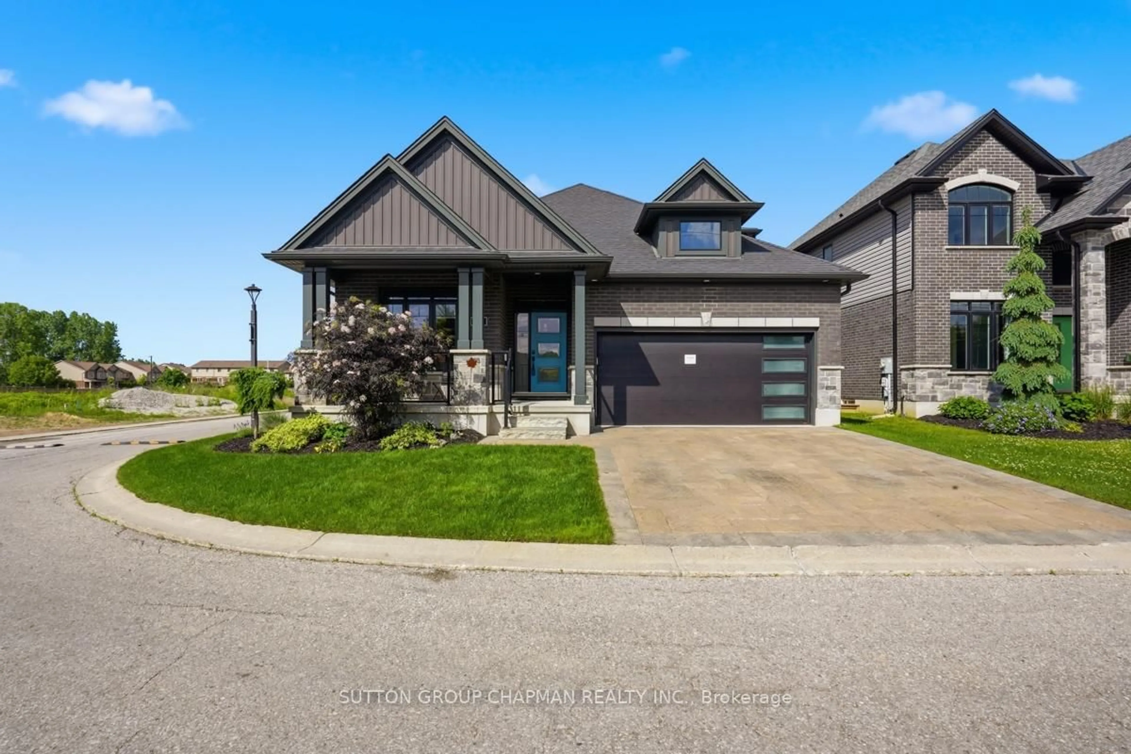 Home with brick exterior material, street for 1061 Eagletrace Dr #190, London North Ontario N6G 0T3