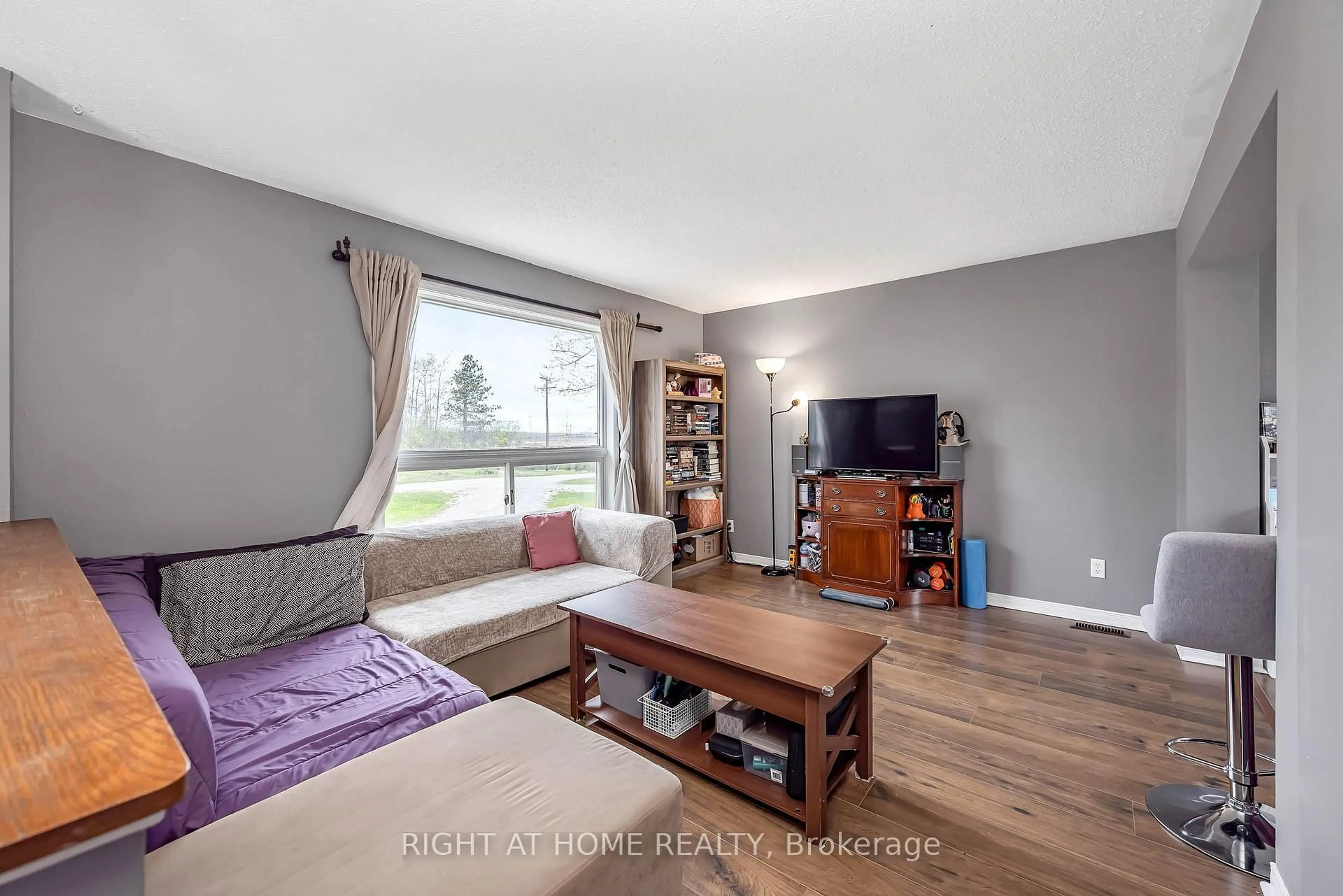 Living room with furniture, wood/laminate floor for 637 Townline Rd, Elizabethtown-Kitley Ontario K7A 4S5