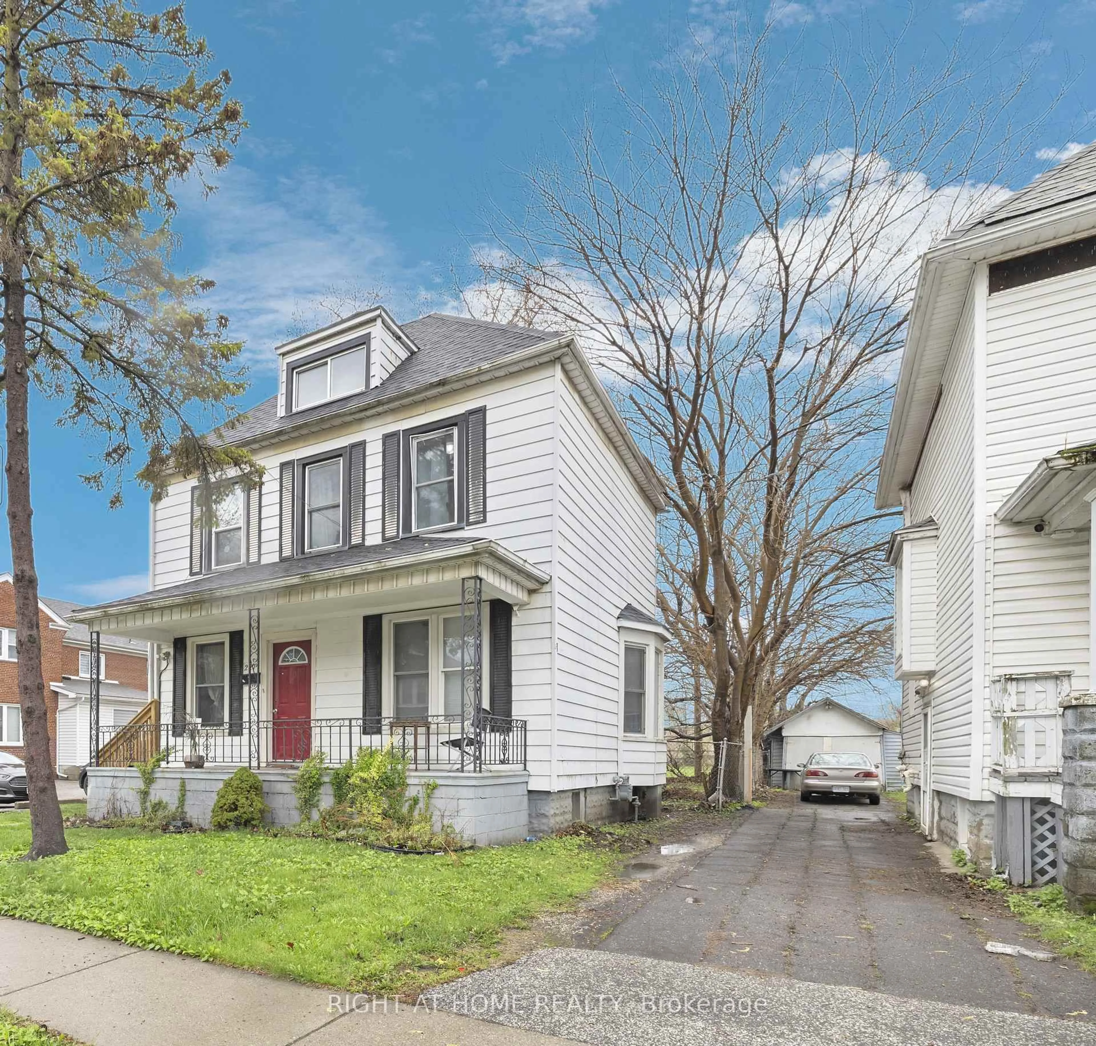 Home with vinyl exterior material, street for 227 Bridge Ave, Windsor Ontario N9B 2M1