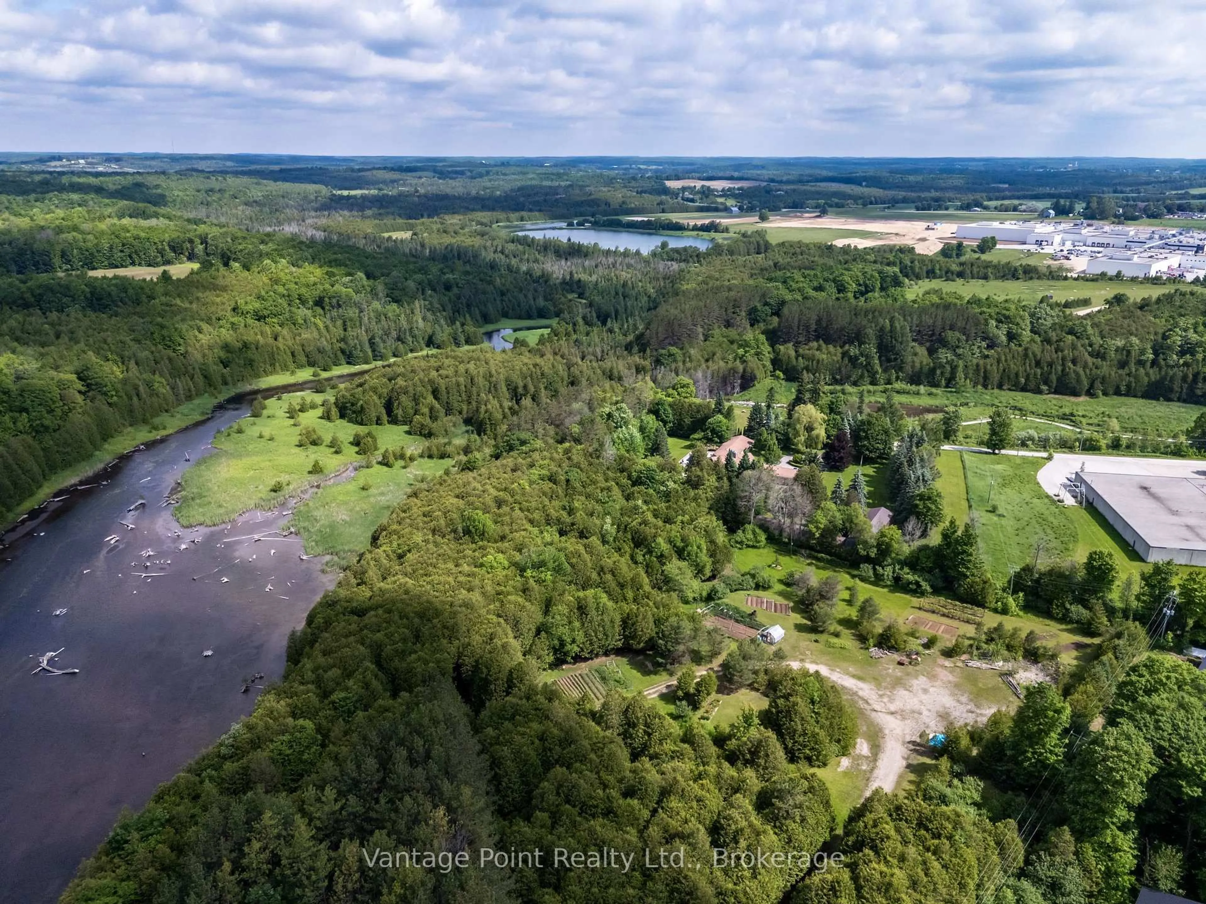 A pic from outside/outdoor area/front of a property/back of a property/a pic from drone, water/lake/river/ocean view for 94 Fords Dr, Grey Highlands Ontario N0C 1H0