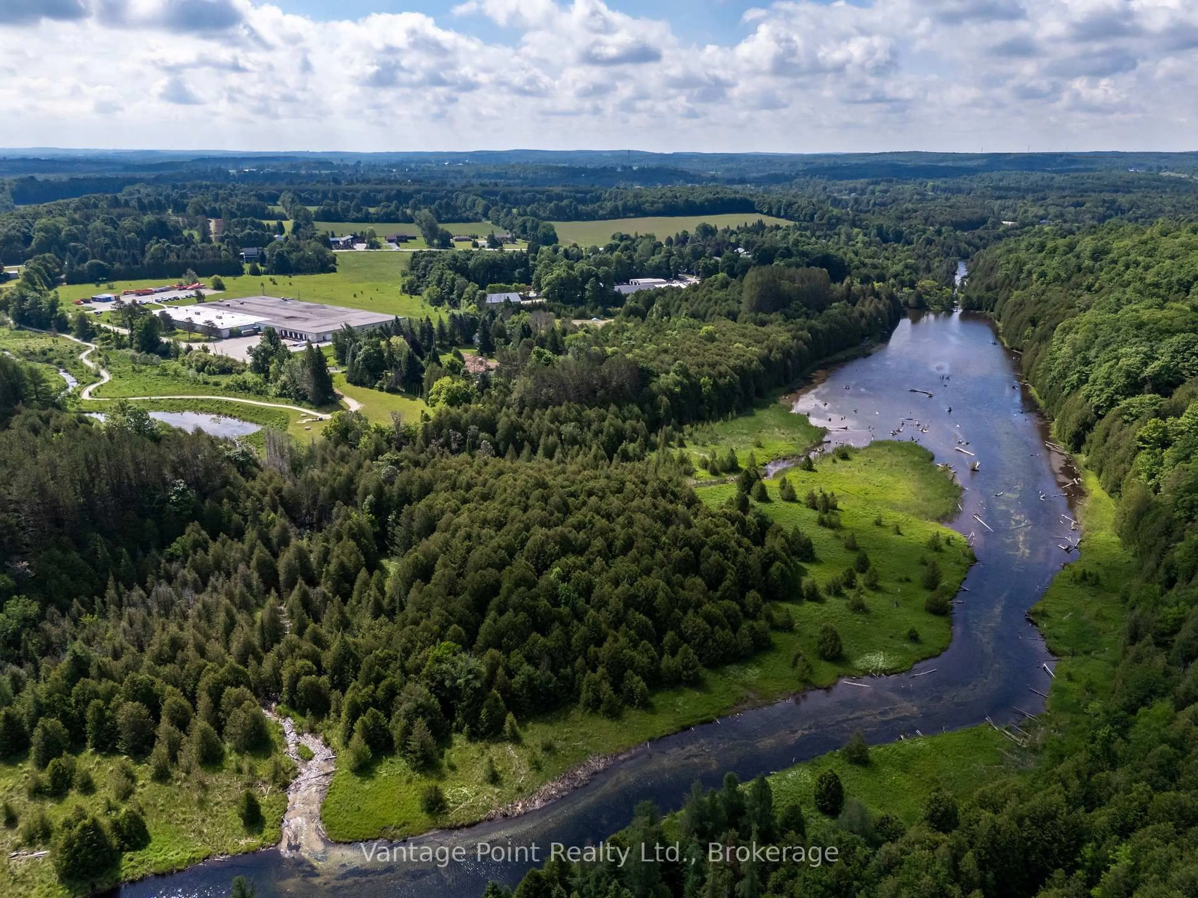 A pic from outside/outdoor area/front of a property/back of a property/a pic from drone, water/lake/river/ocean view for 94 Fords Dr, Grey Highlands Ontario N0C 1H0