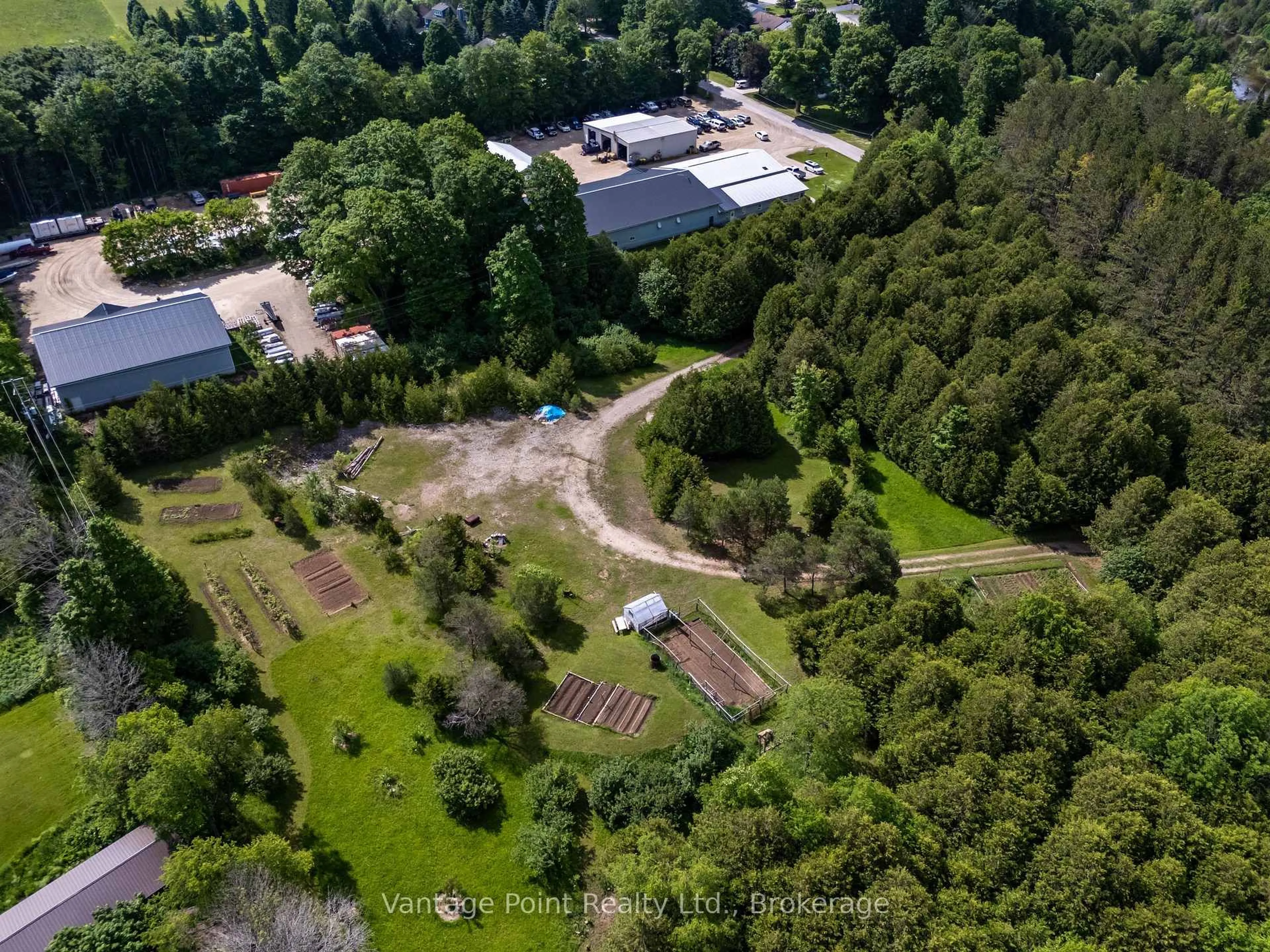 A pic from outside/outdoor area/front of a property/back of a property/a pic from drone, forest/trees view for 94 Fords Dr, Grey Highlands Ontario N0C 1H0