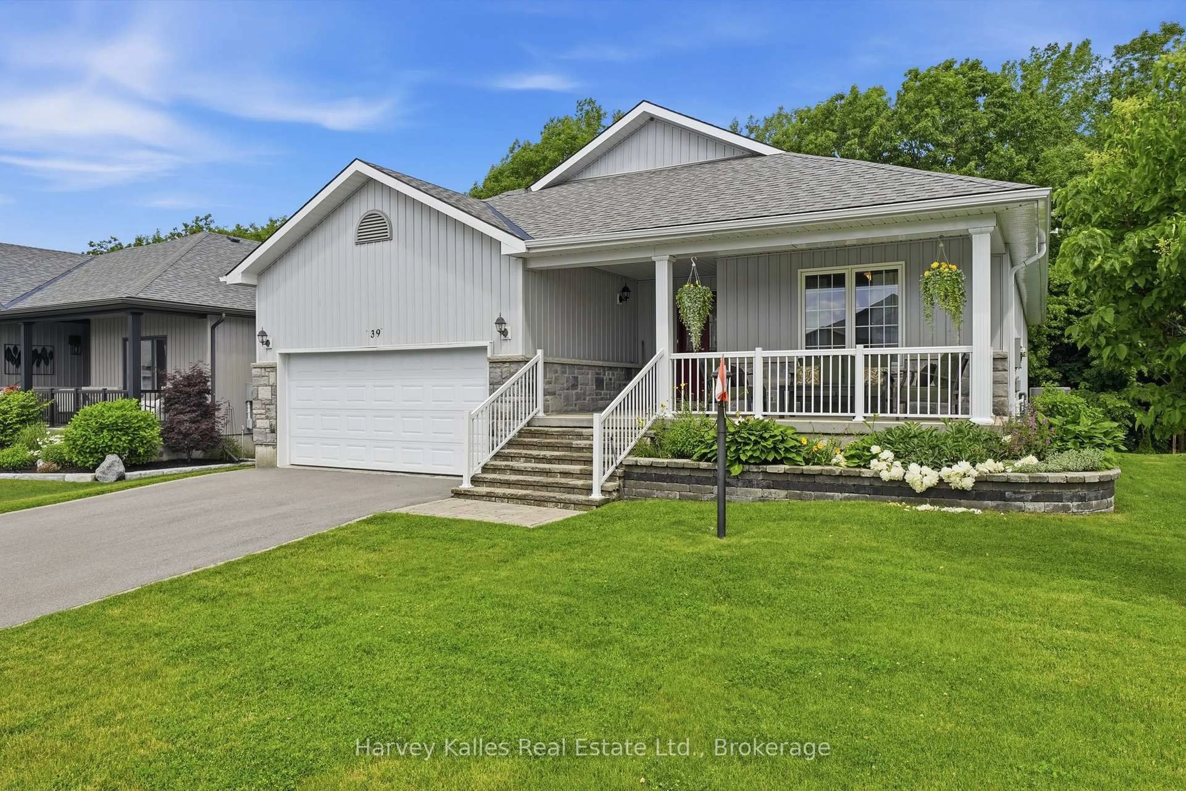 Home with vinyl exterior material, street for 39 Conger Dr, Prince Edward County Ontario K0K 3L0