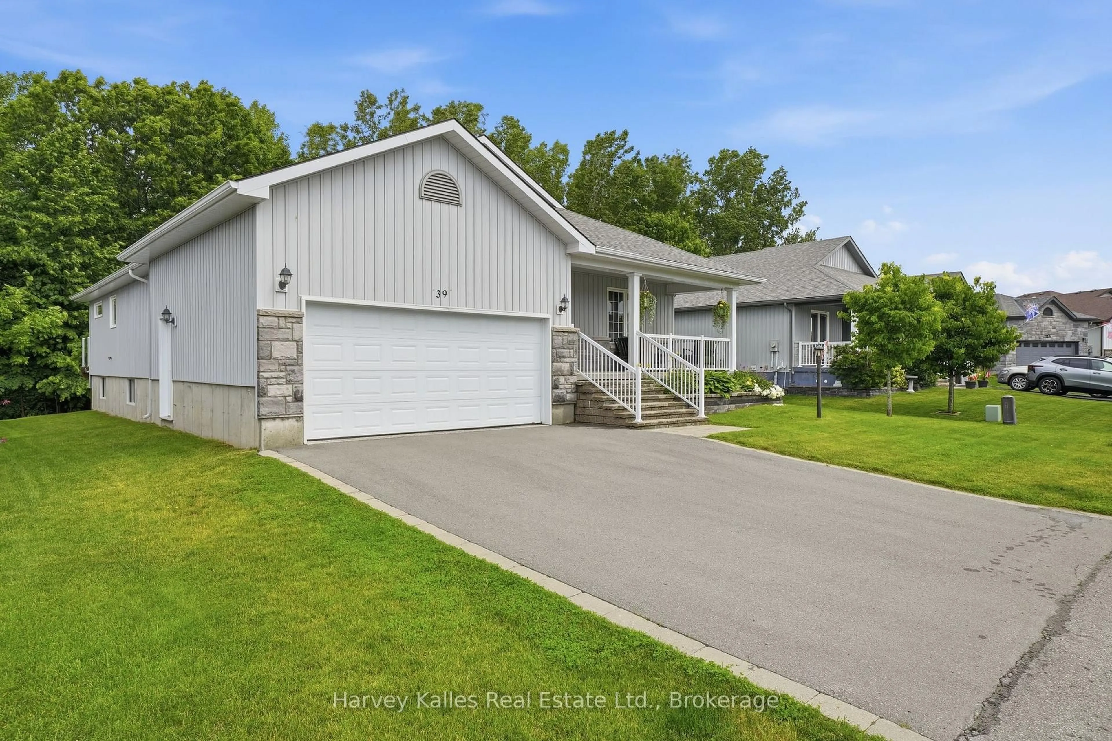 Home with vinyl exterior material, street for 39 Conger Dr, Prince Edward County Ontario K0K 3L0