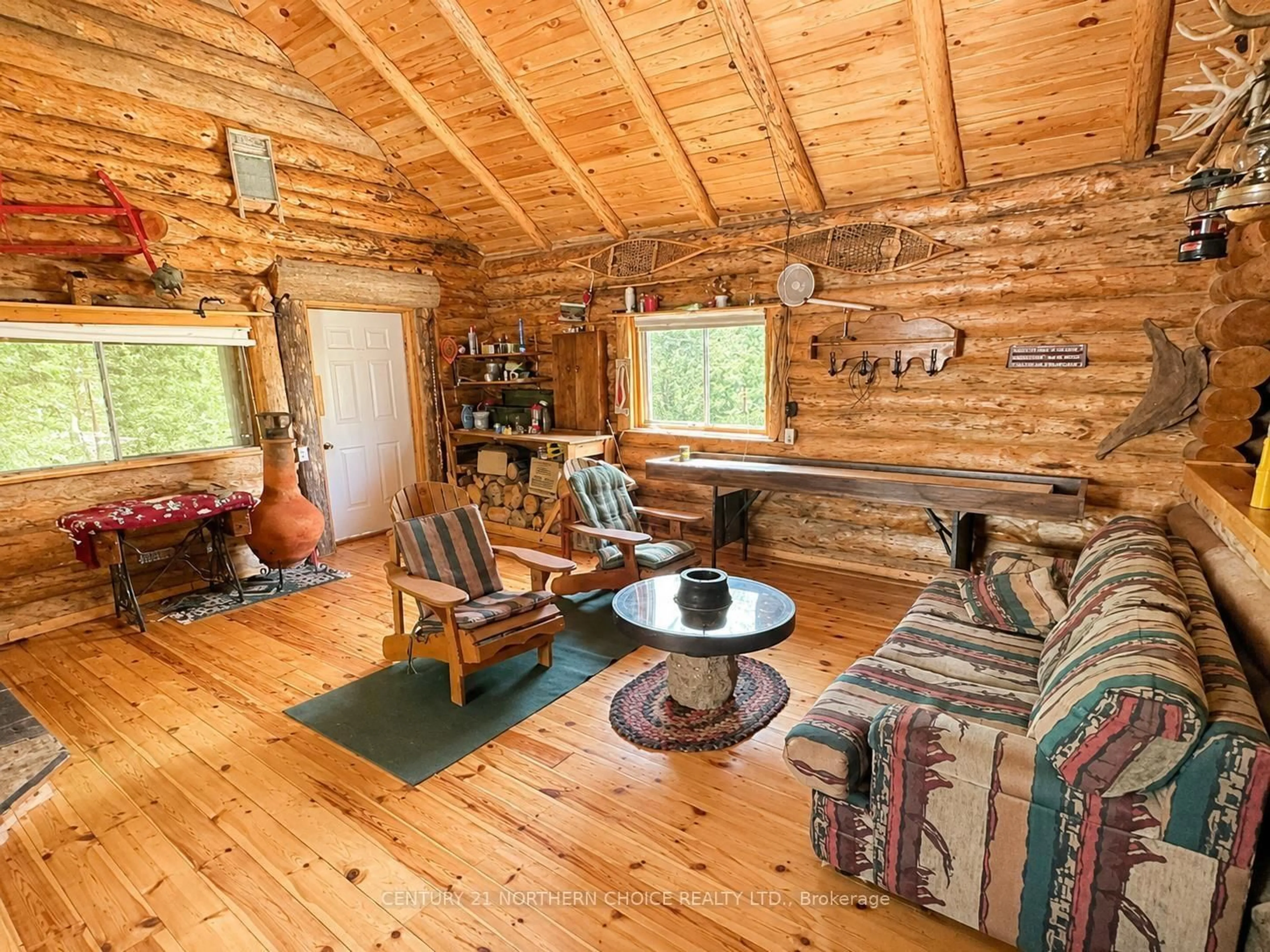 Living room with furniture, wood/laminate floor for PCL 5005 Confederation, Kenora Remote Area Ontario P0V 1T0