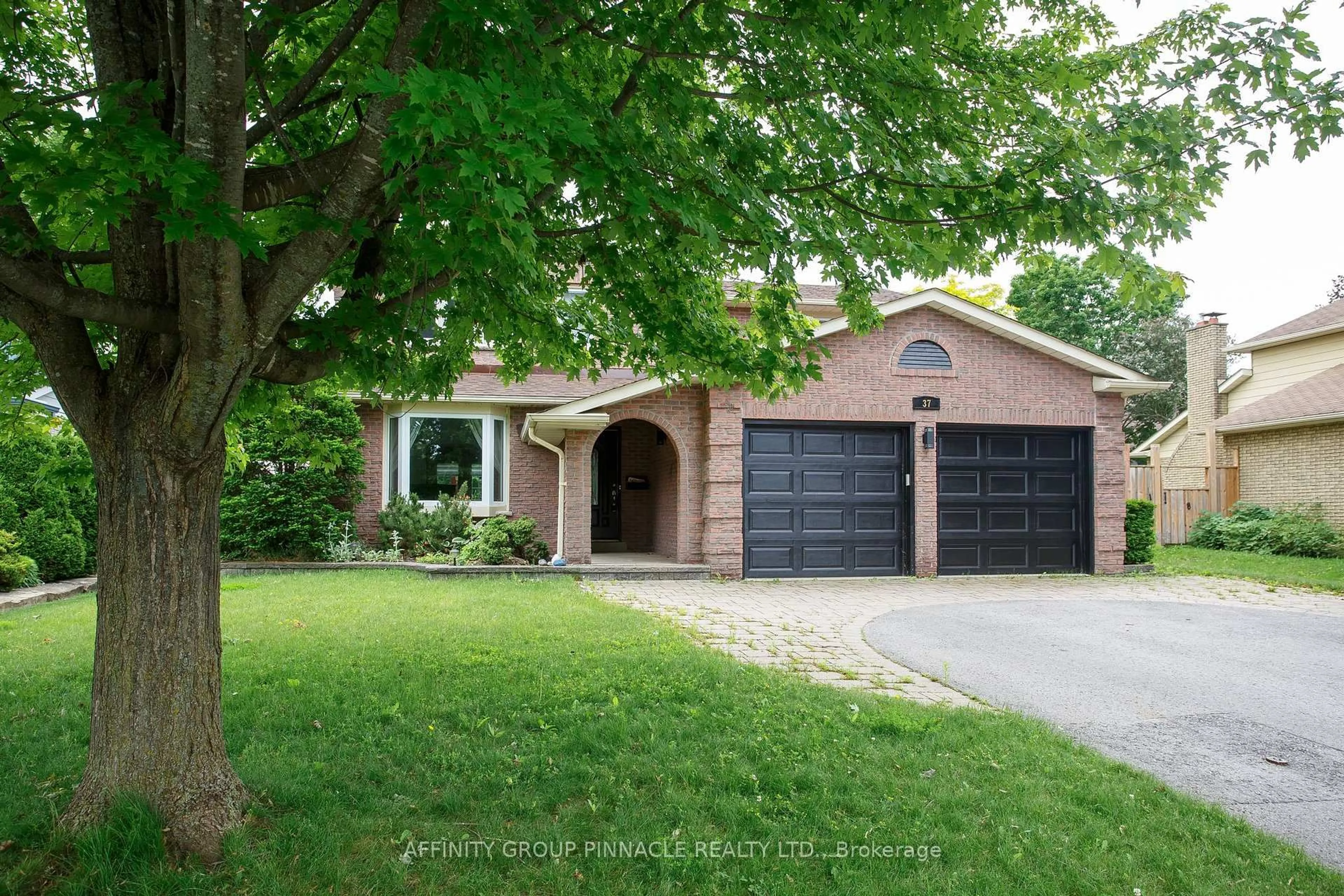 Home with brick exterior material, street for 37 Parkway Ave, Kawartha Lakes Ontario K9V 5J7