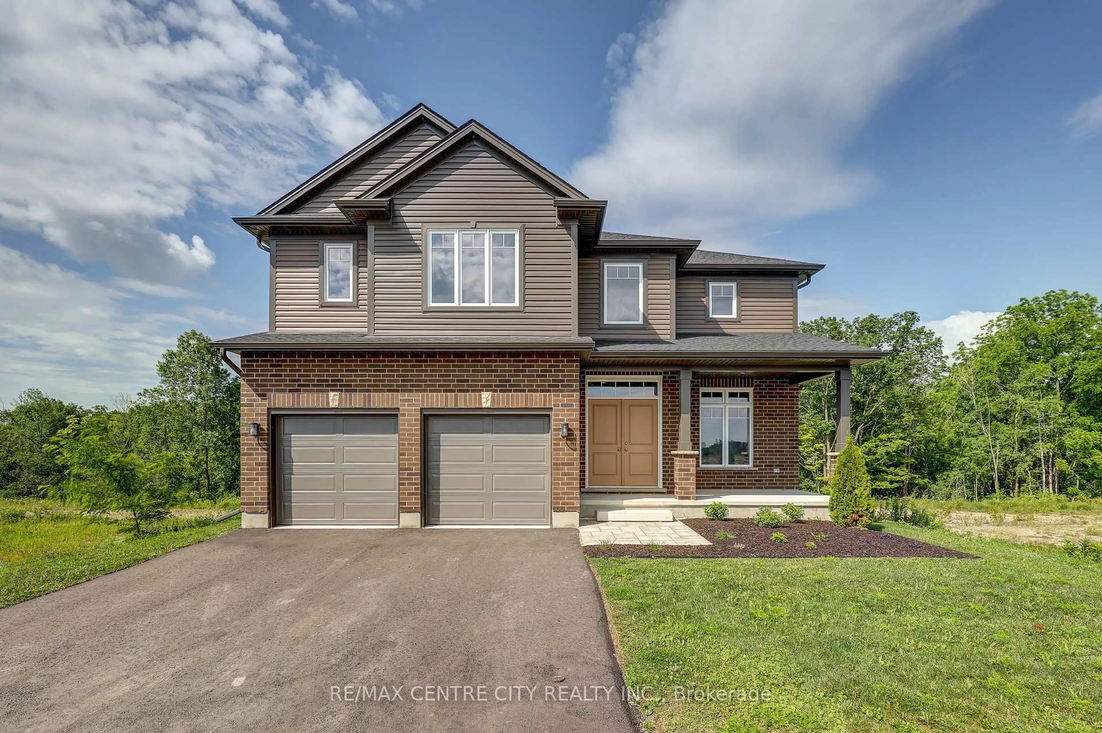 Home with brick exterior material, street for 58 ASPEN Pkwy, Aylmer Ontario N5H 3H7