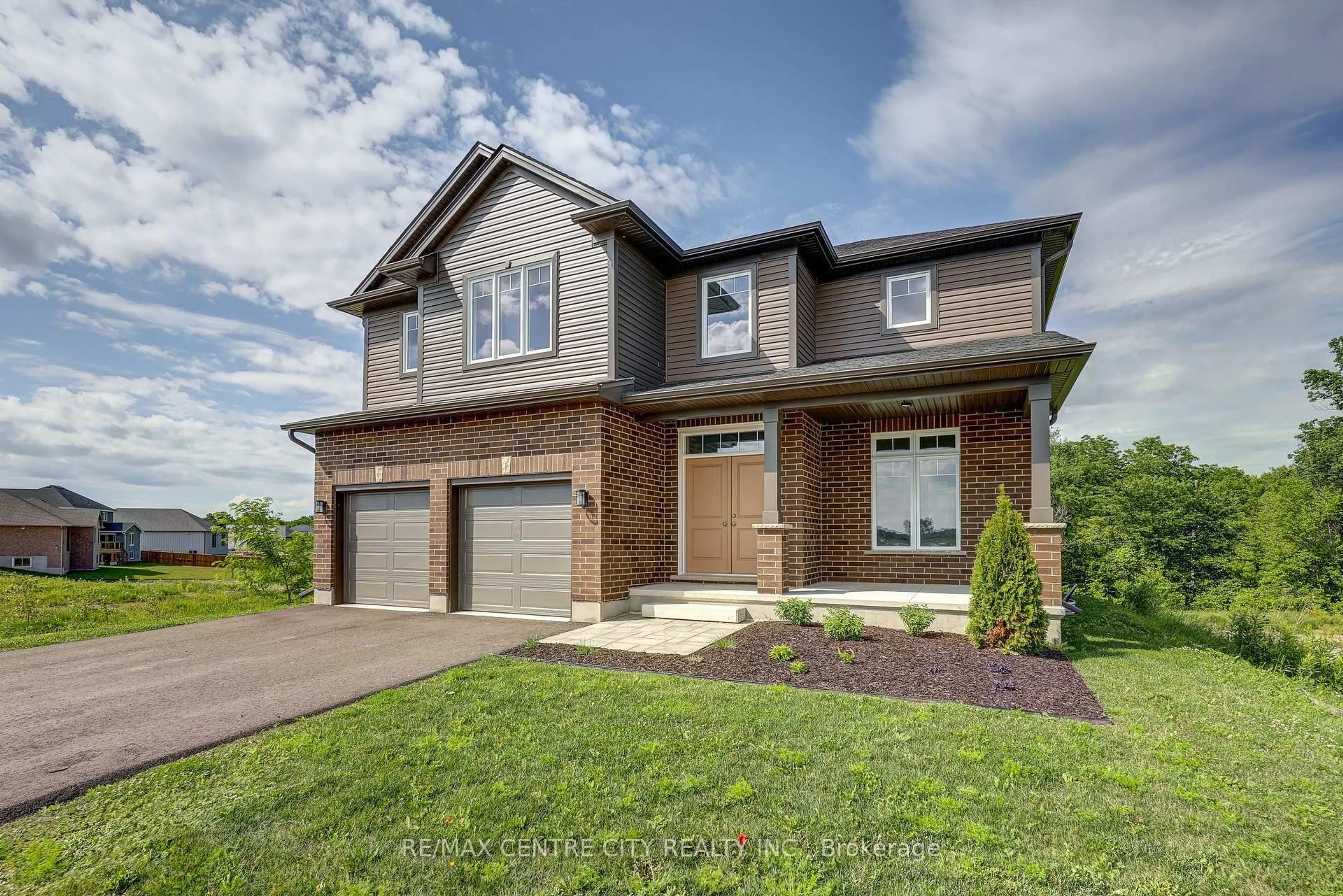 Home with brick exterior material, street for 58 ASPEN Pkwy, Aylmer Ontario N5H 3H7
