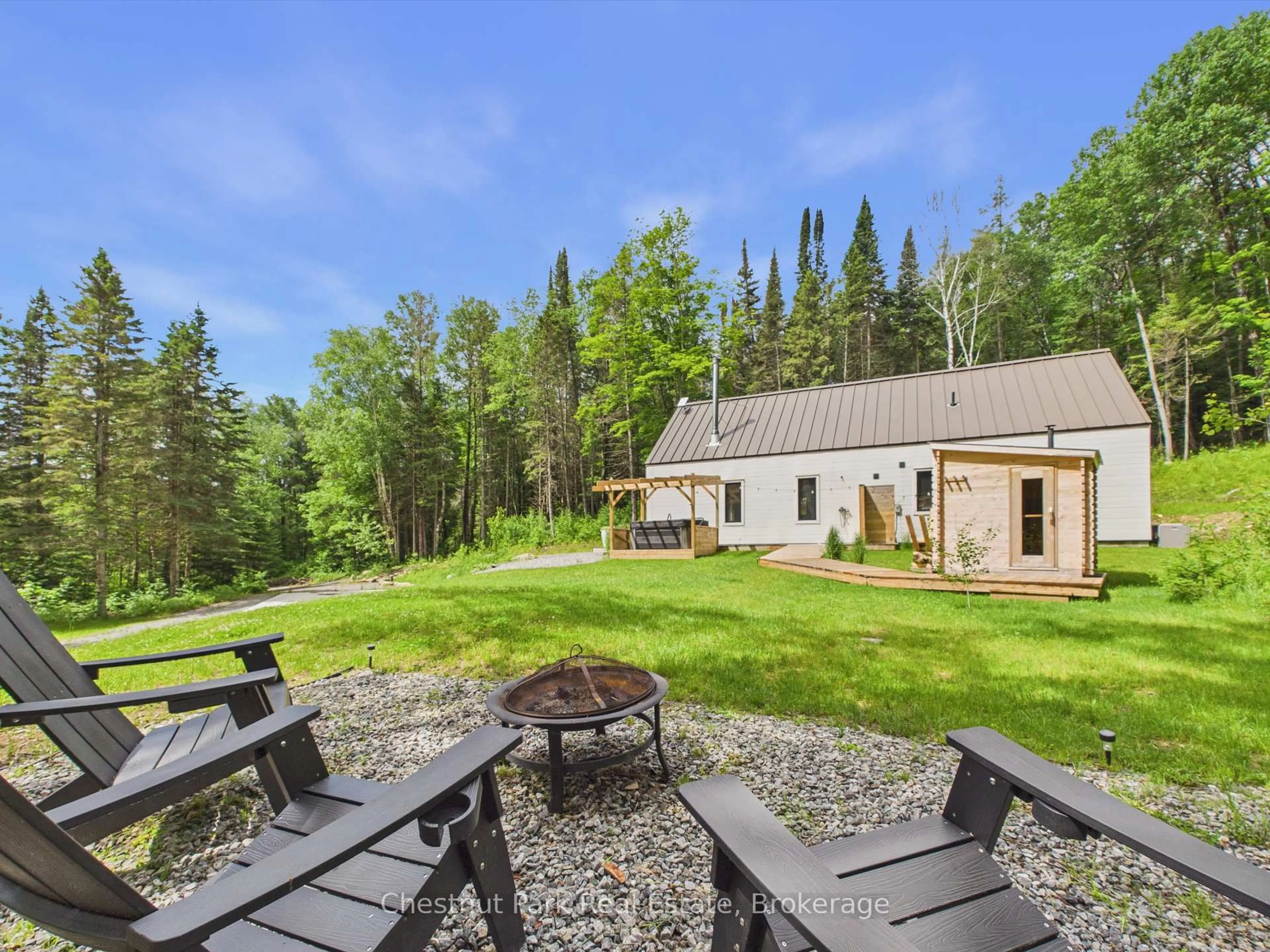 Patio, forest/trees view for 622 Fish Lake Rd, Huntsville Ontario P1H 2J6