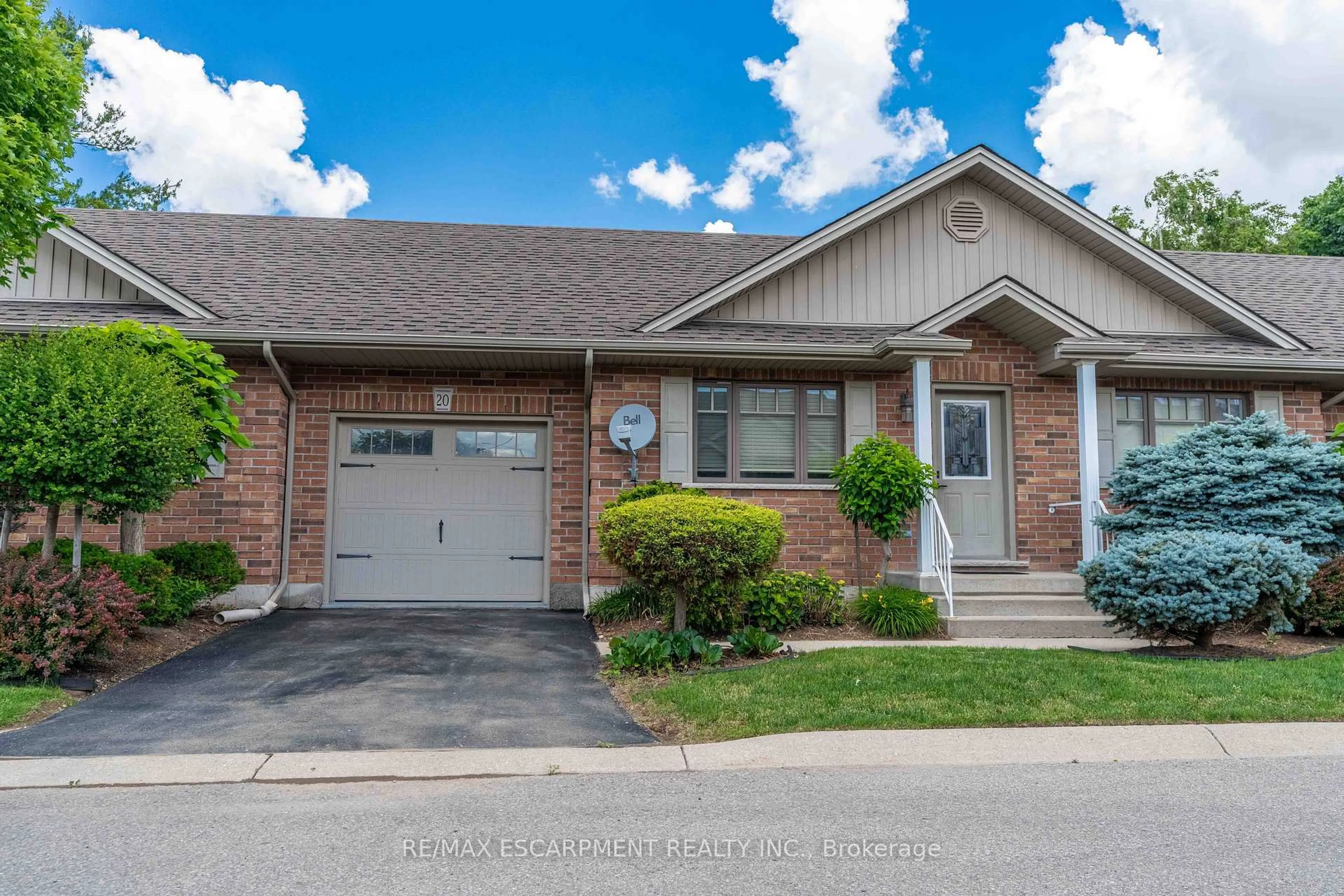 Home with brick exterior material, street for 20 Trinity Lane #20, Norfolk Ontario N0E 1Y0