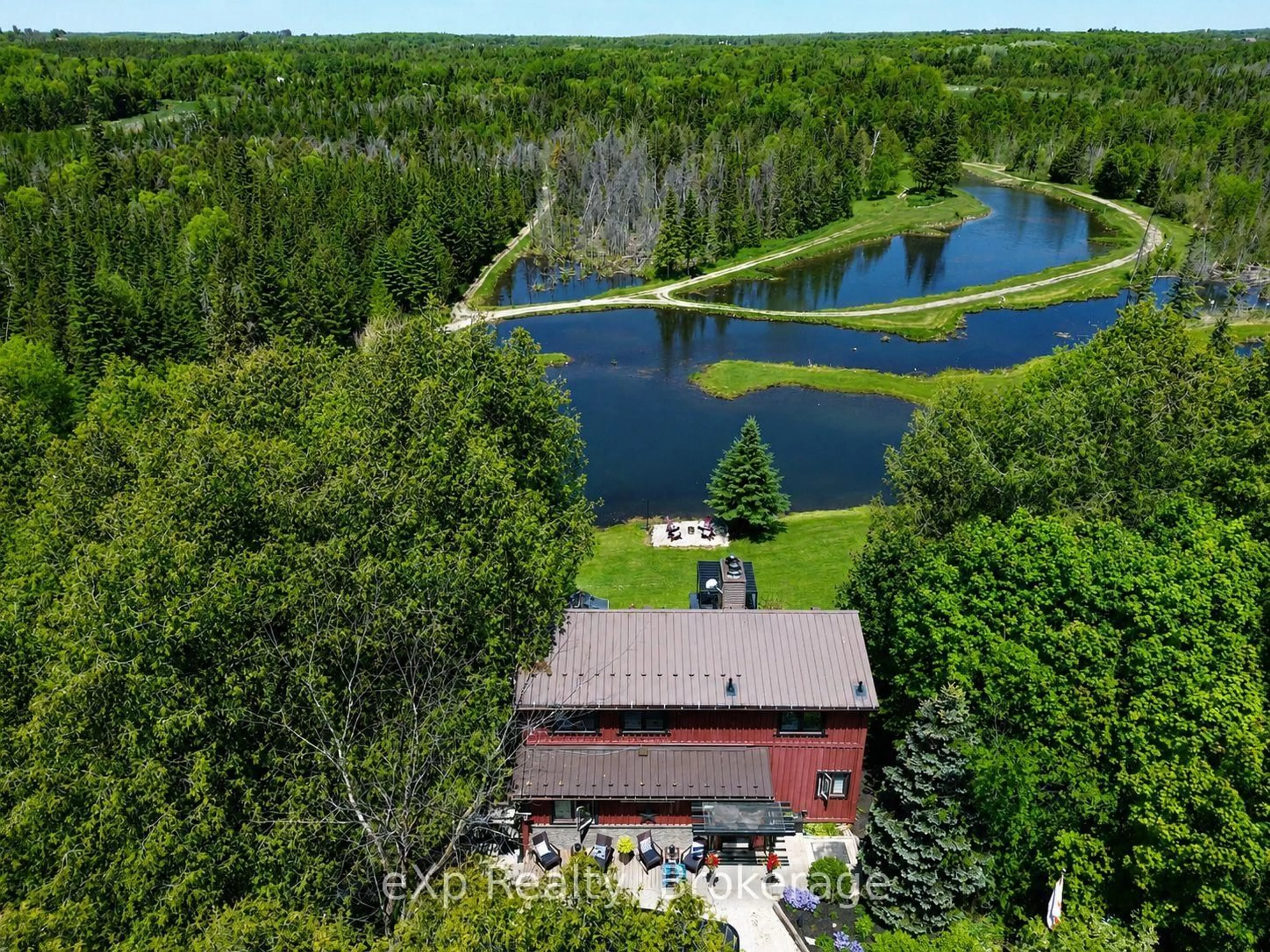 A pic from outside/outdoor area/front of a property/back of a property/a pic from drone, water/lake/river/ocean view for 407047 Grey 4 Rd, Grey Highlands Ontario N0C 1E0