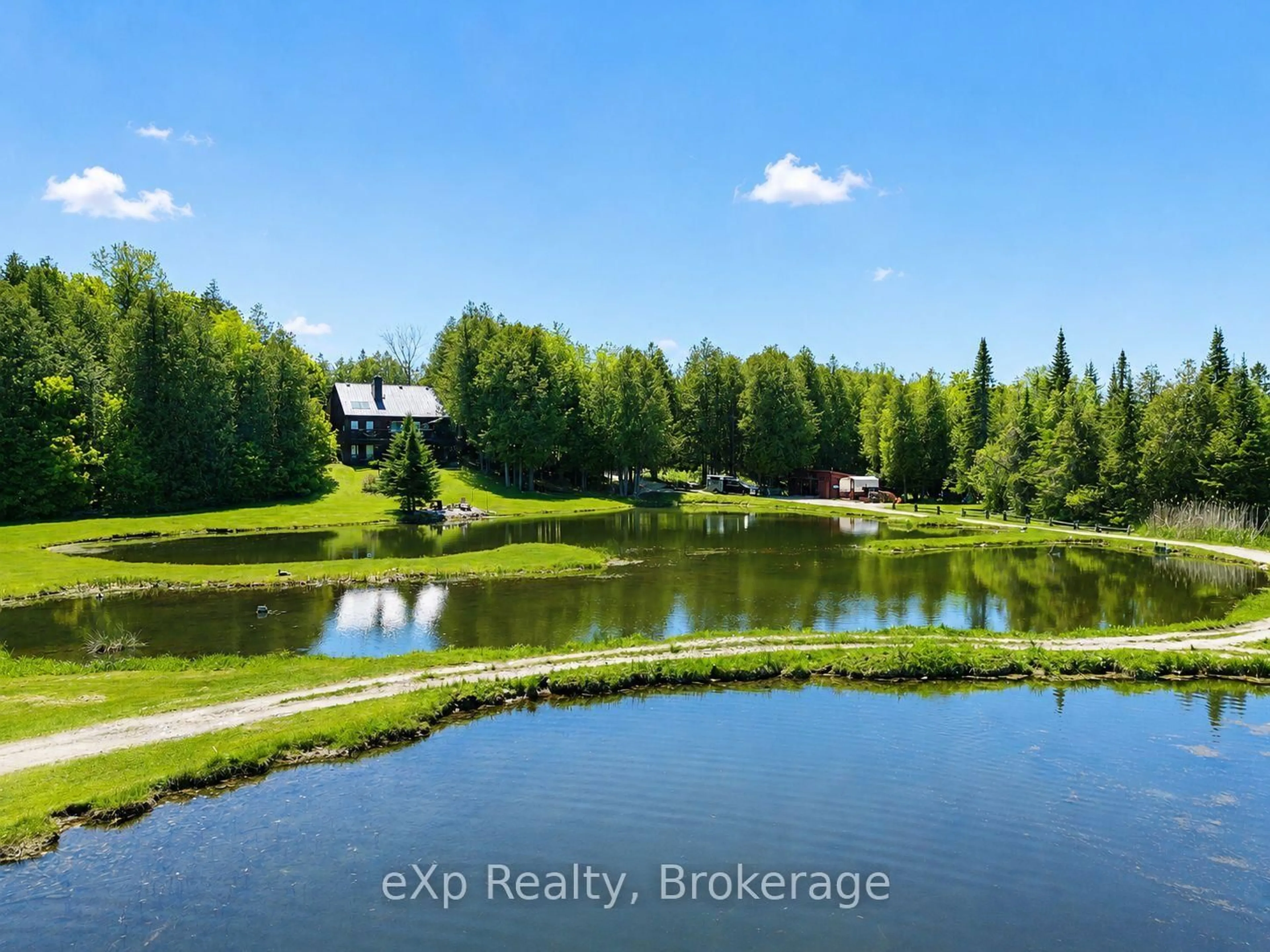 A pic from outside/outdoor area/front of a property/back of a property/a pic from drone, water/lake/river/ocean view for 407047 Grey 4 Rd, Grey Highlands Ontario N0C 1E0