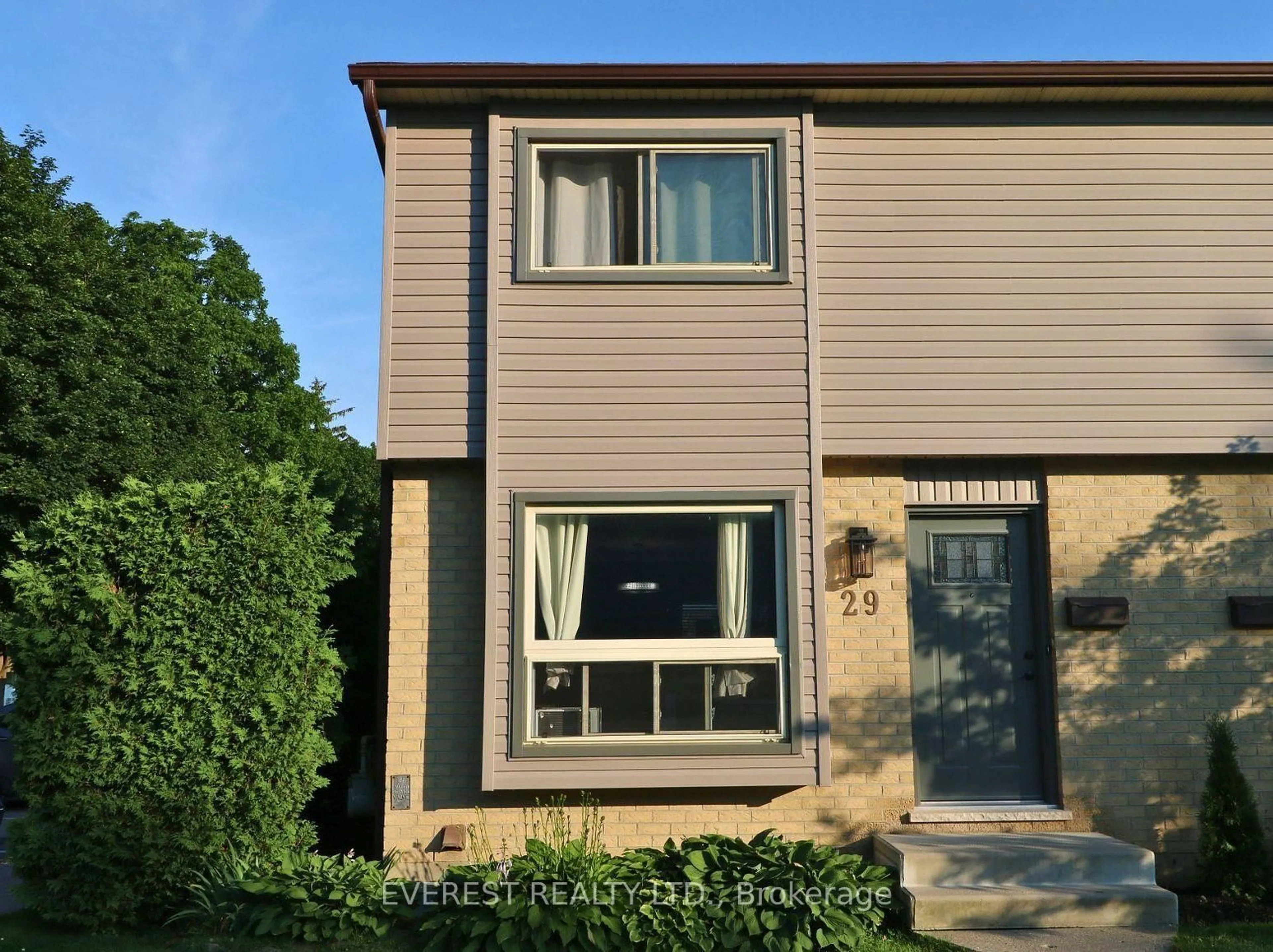 Home with vinyl exterior material, street for 253 Taylor St #29, London East Ontario N5Y 2J6