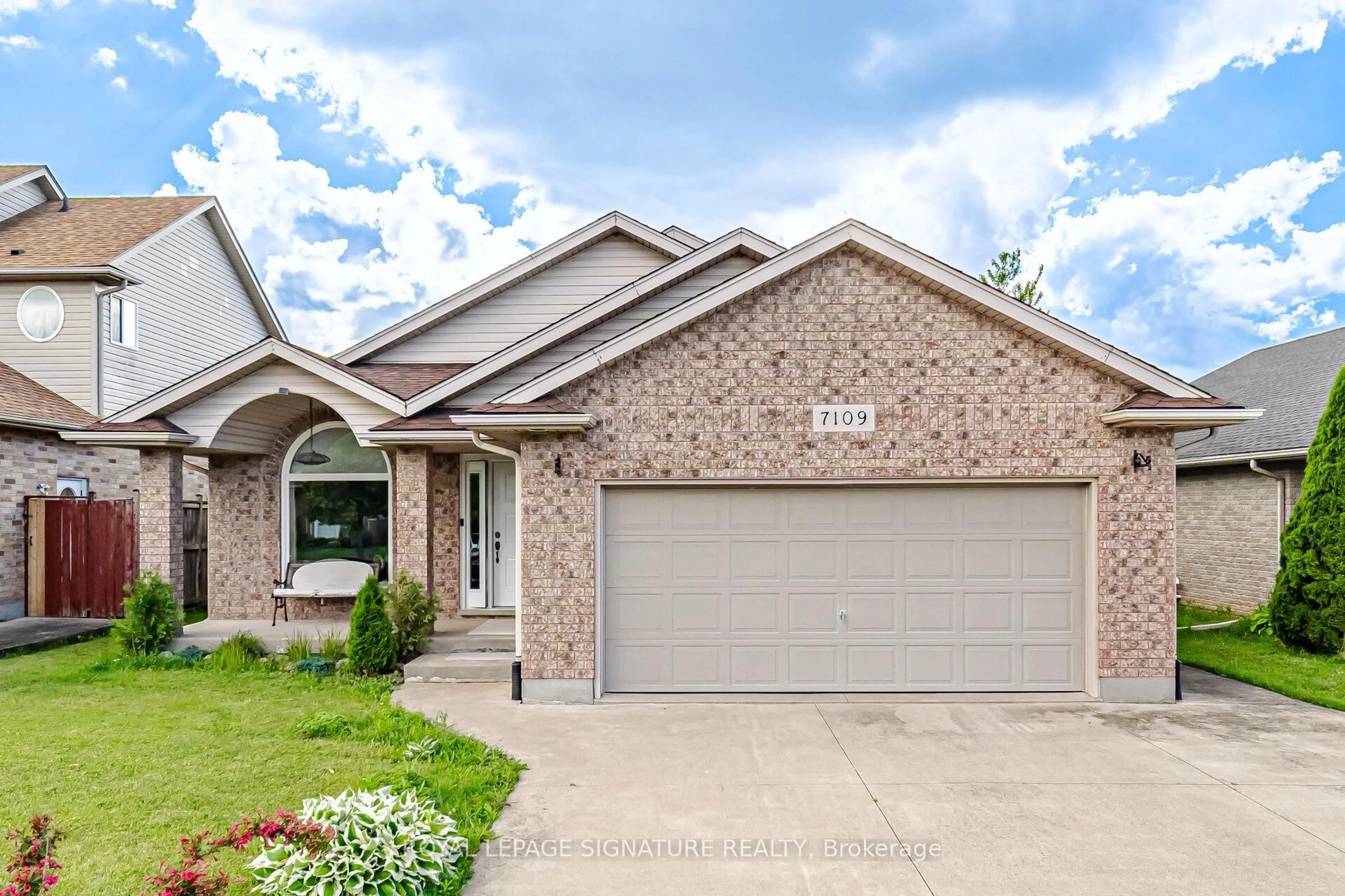 Home with brick exterior material, street for 7109 Parkside Rd, Niagara Falls Ontario L2H 3L6
