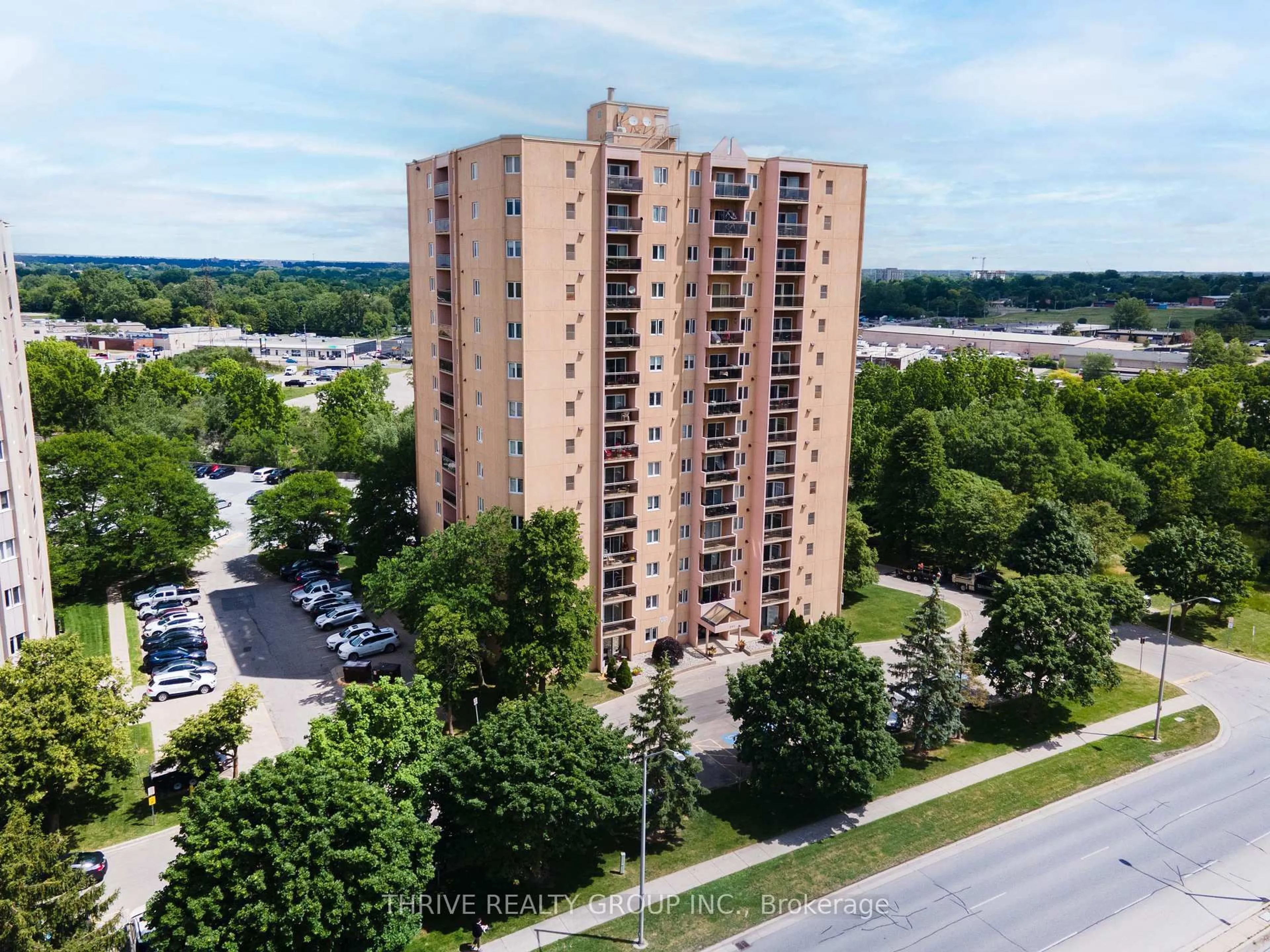A pic from outside/outdoor area/front of a property/back of a property/a pic from drone, unknown for 860 Commissioners Rd #1403, London South Ontario N6C 5Y8