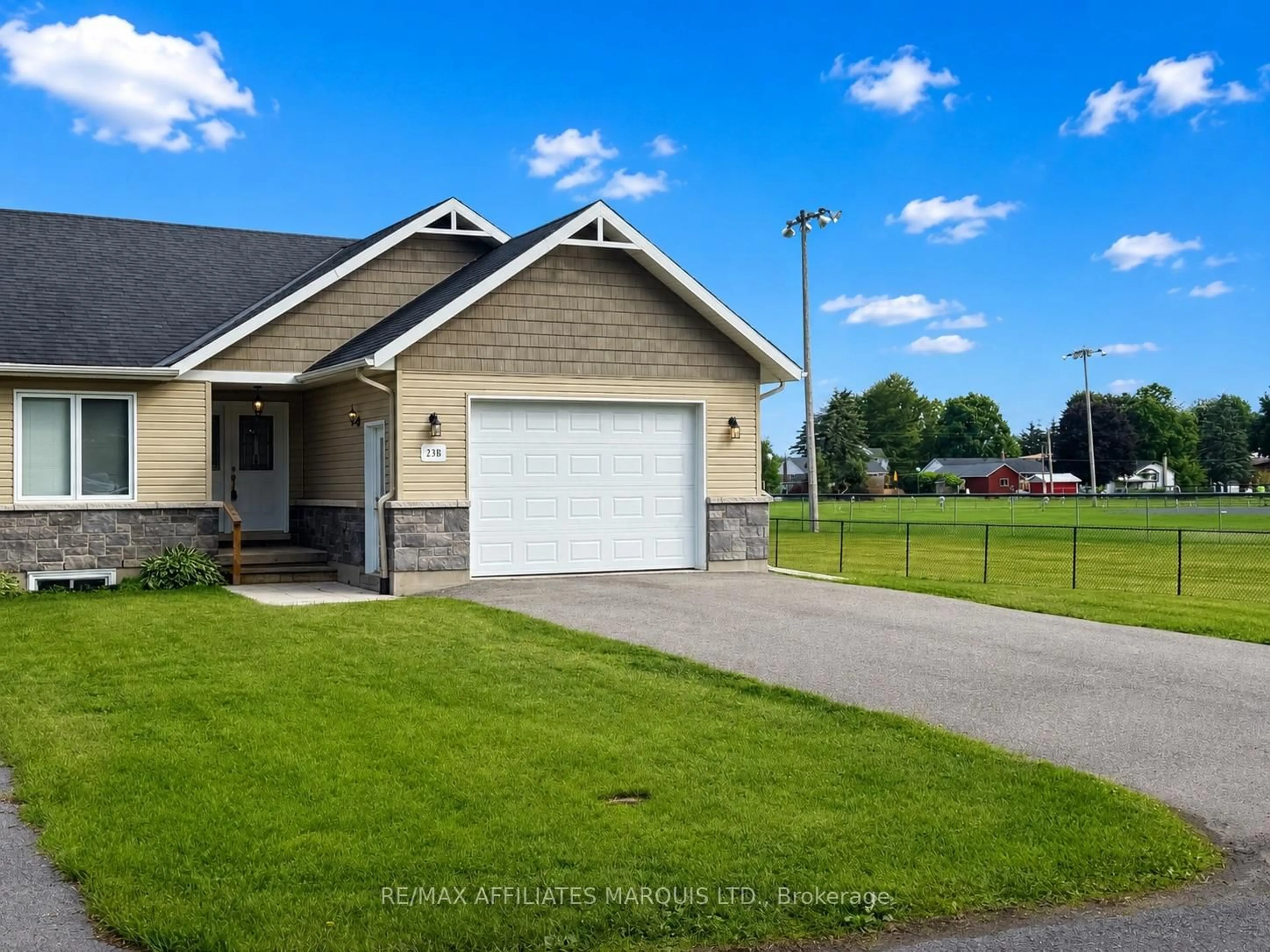 Home with vinyl exterior material, street for 23B Caldwell Dr, South Dundas Ontario K0E 1K0