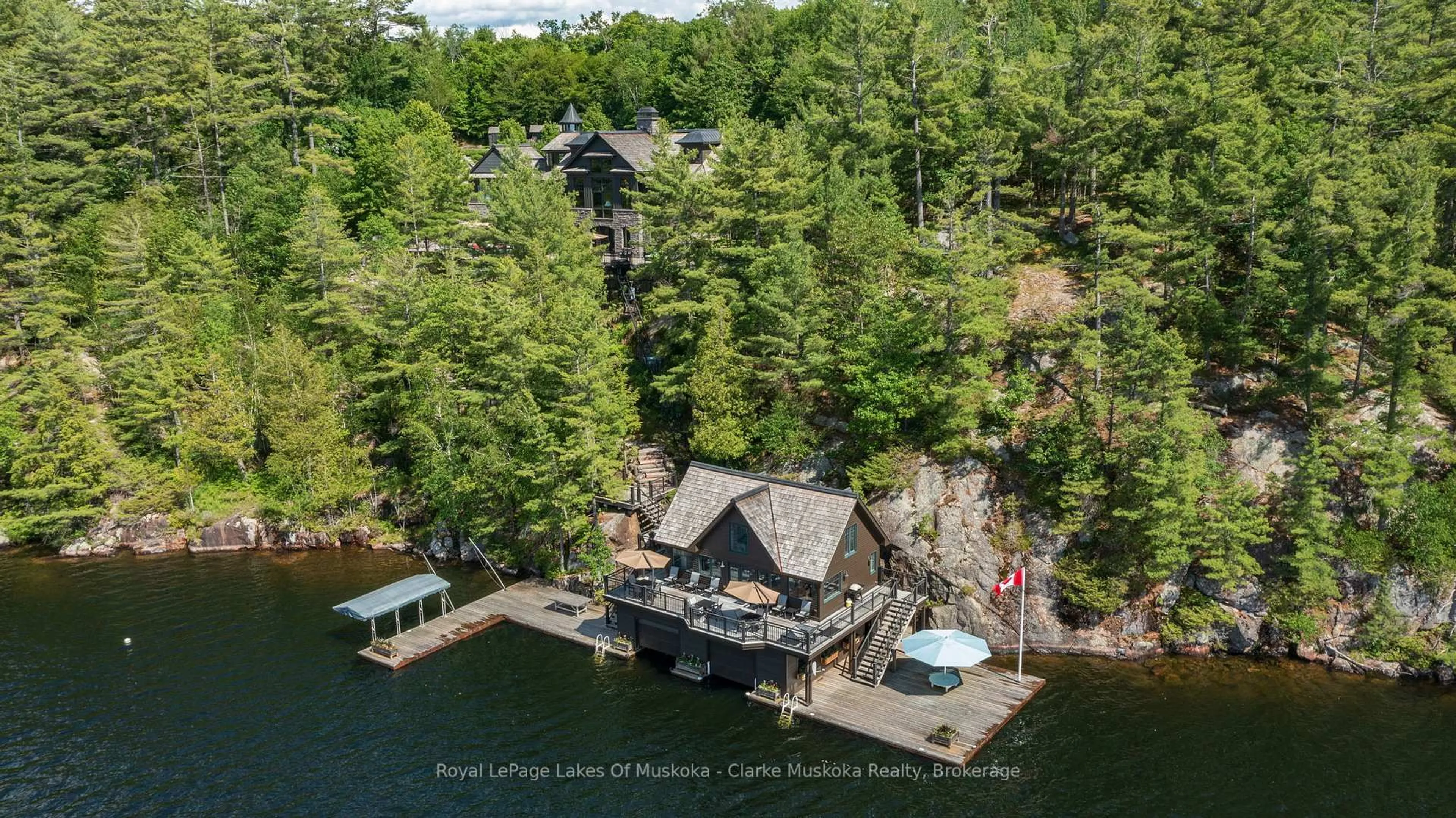 A pic from outside/outdoor area/front of a property/back of a property/a pic from drone, water/lake/river/ocean view for 1108 Robert Johnston Rd #1, Muskoka Lakes Ontario P0B 1J0