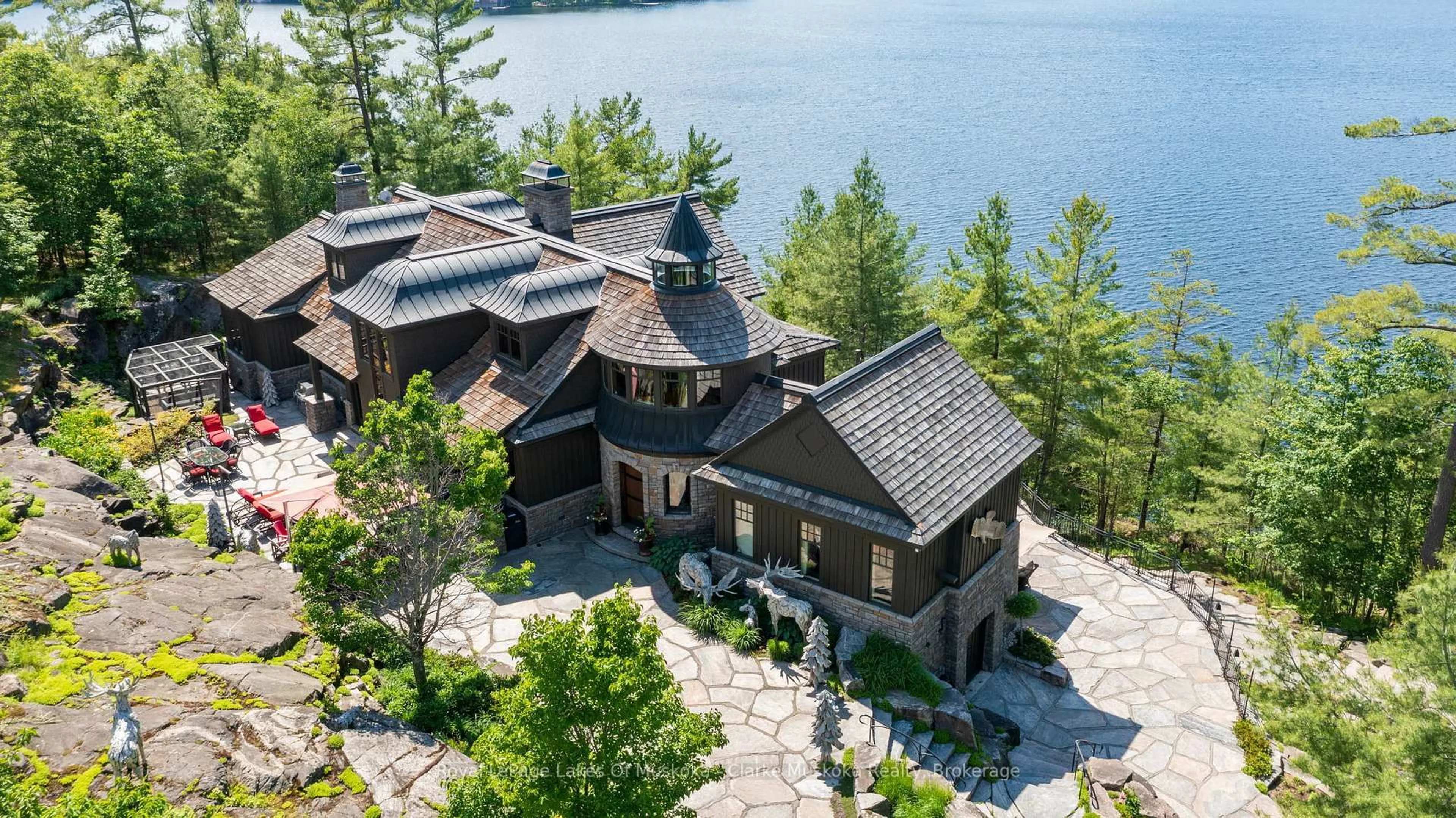 A pic from outside/outdoor area/front of a property/back of a property/a pic from drone, water/lake/river/ocean view for 1108 Robert Johnston Rd #1, Muskoka Lakes Ontario P0B 1J0