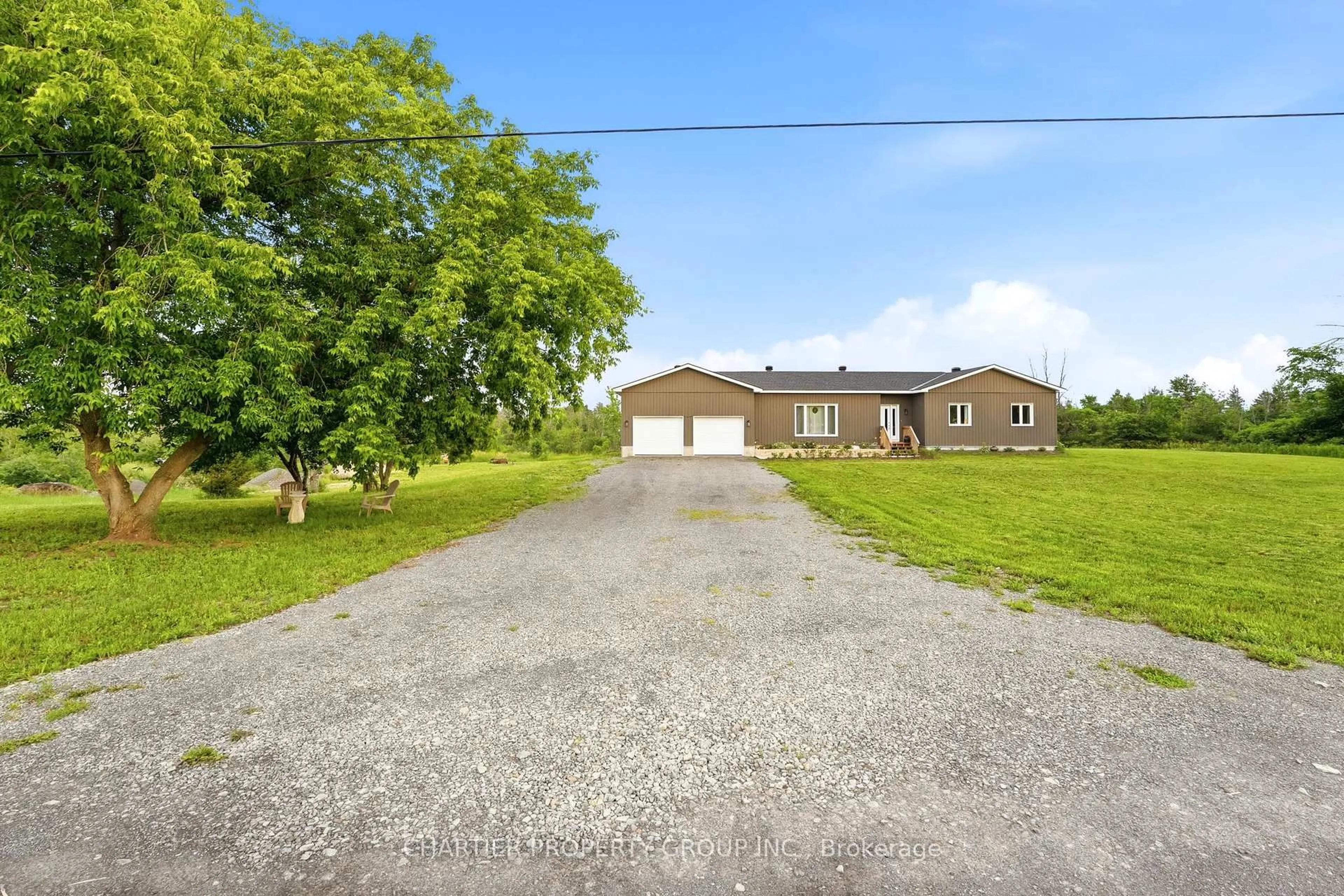 A pic from outside/outdoor area/front of a property/back of a property/a pic from drone, street for 10664 Blaine Rd, North Dundas Ontario K0E 1S0