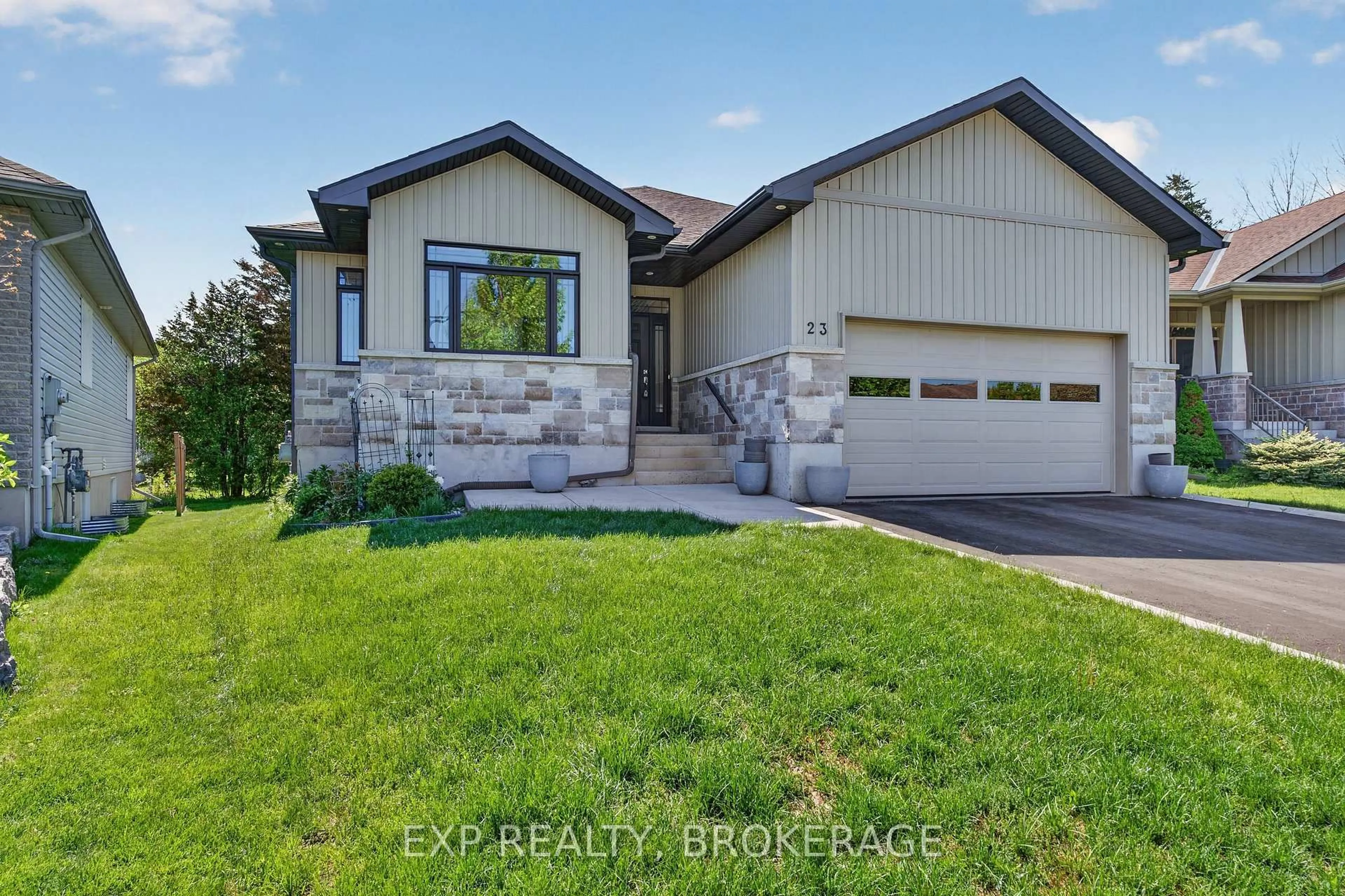 Home with brick exterior material, street for 23 ADMIRAL'S Crt, Bath Ontario K0H 1G0