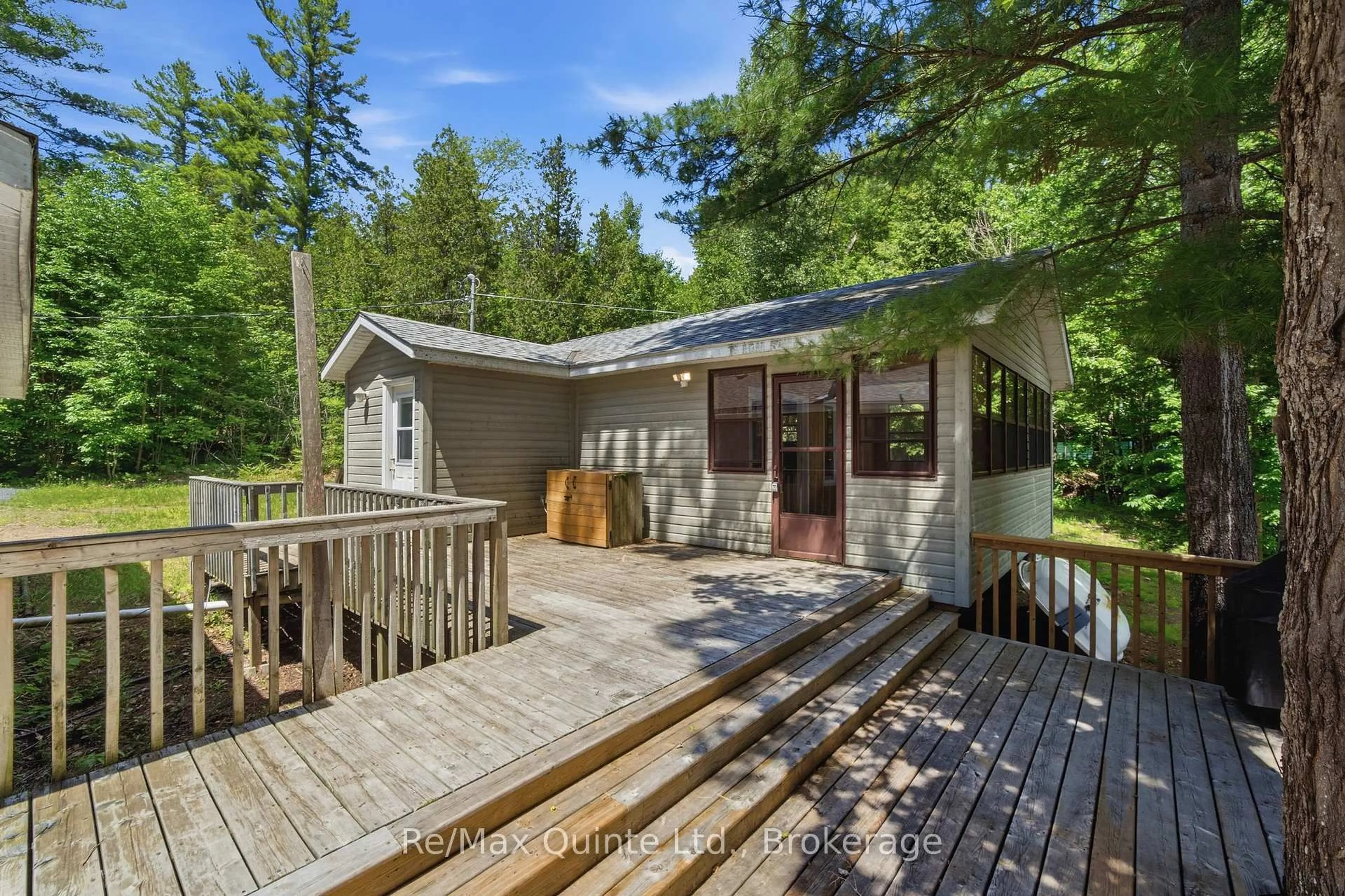 A pic from outside/outdoor area/front of a property/back of a property/a pic from drone, forest/trees view for 1731 Hughes Landing Rd, Cloyne Ontario K0H 1K0
