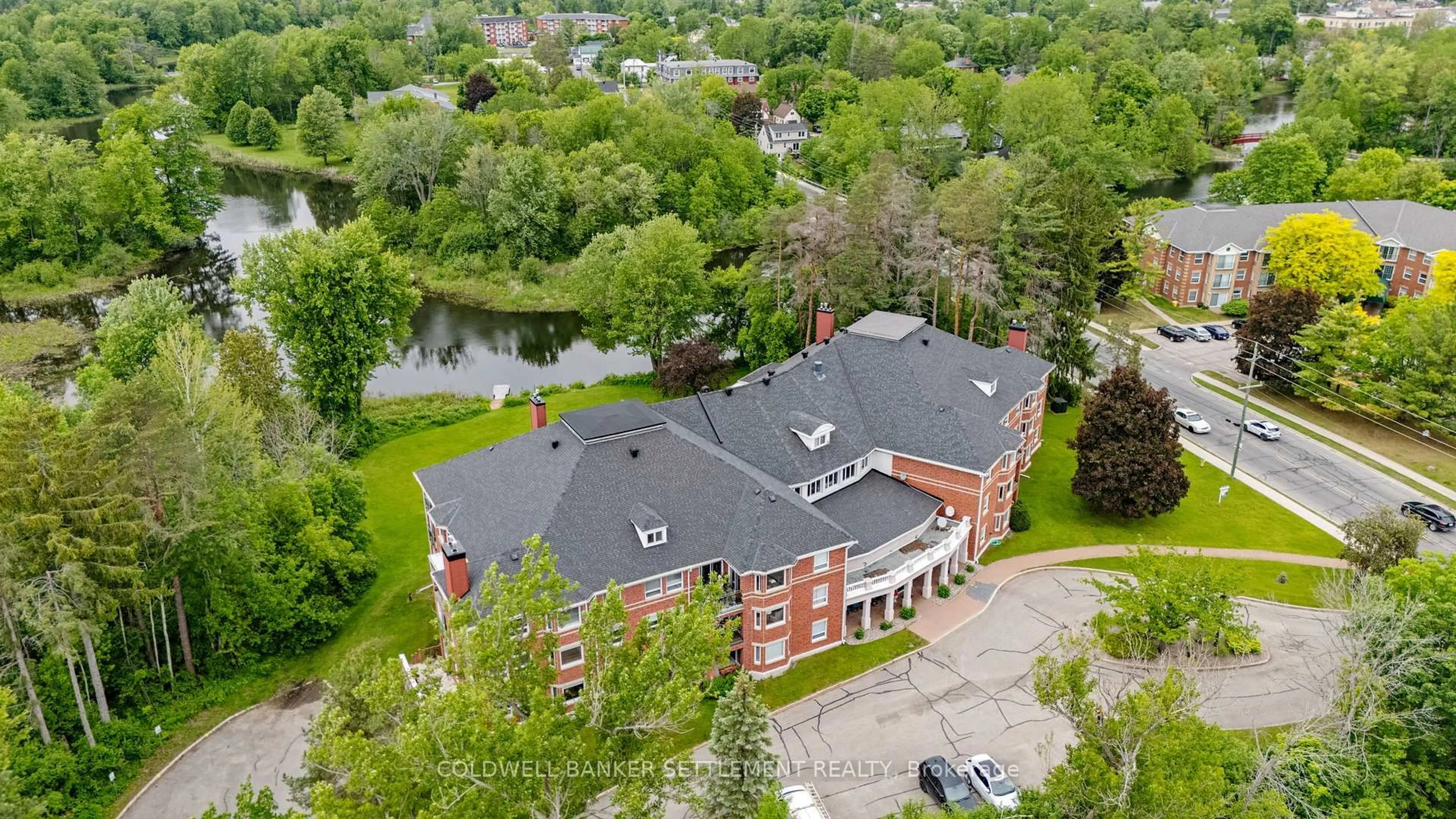 A pic from outside/outdoor area/front of a property/back of a property/a pic from drone, unknown for 23 Rogers Rd #303, Perth Ontario K7H 1P2