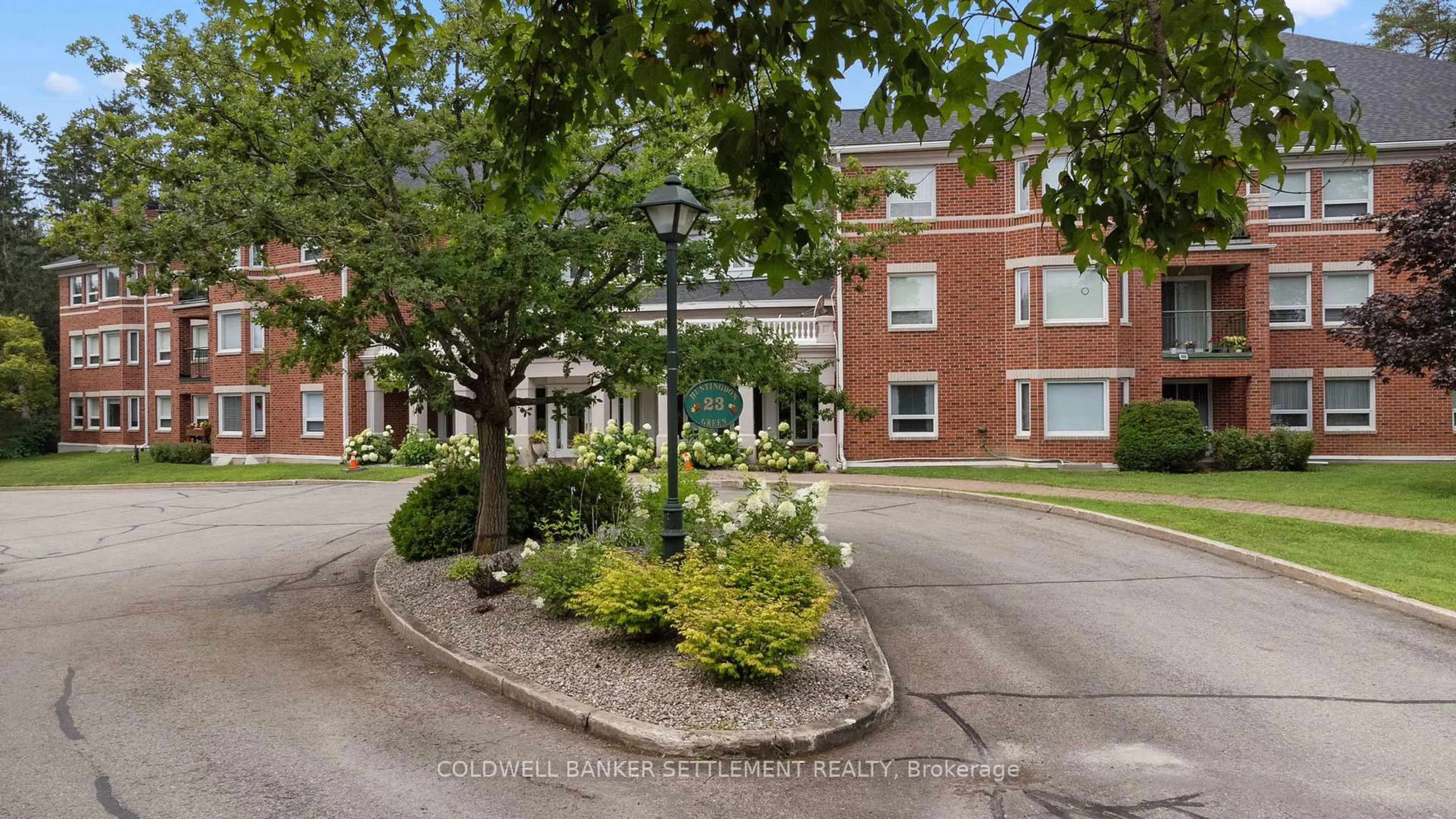 A pic from outside/outdoor area/front of a property/back of a property/a pic from drone, street for 23 Rogers Rd #303, Perth Ontario K7H 1P2