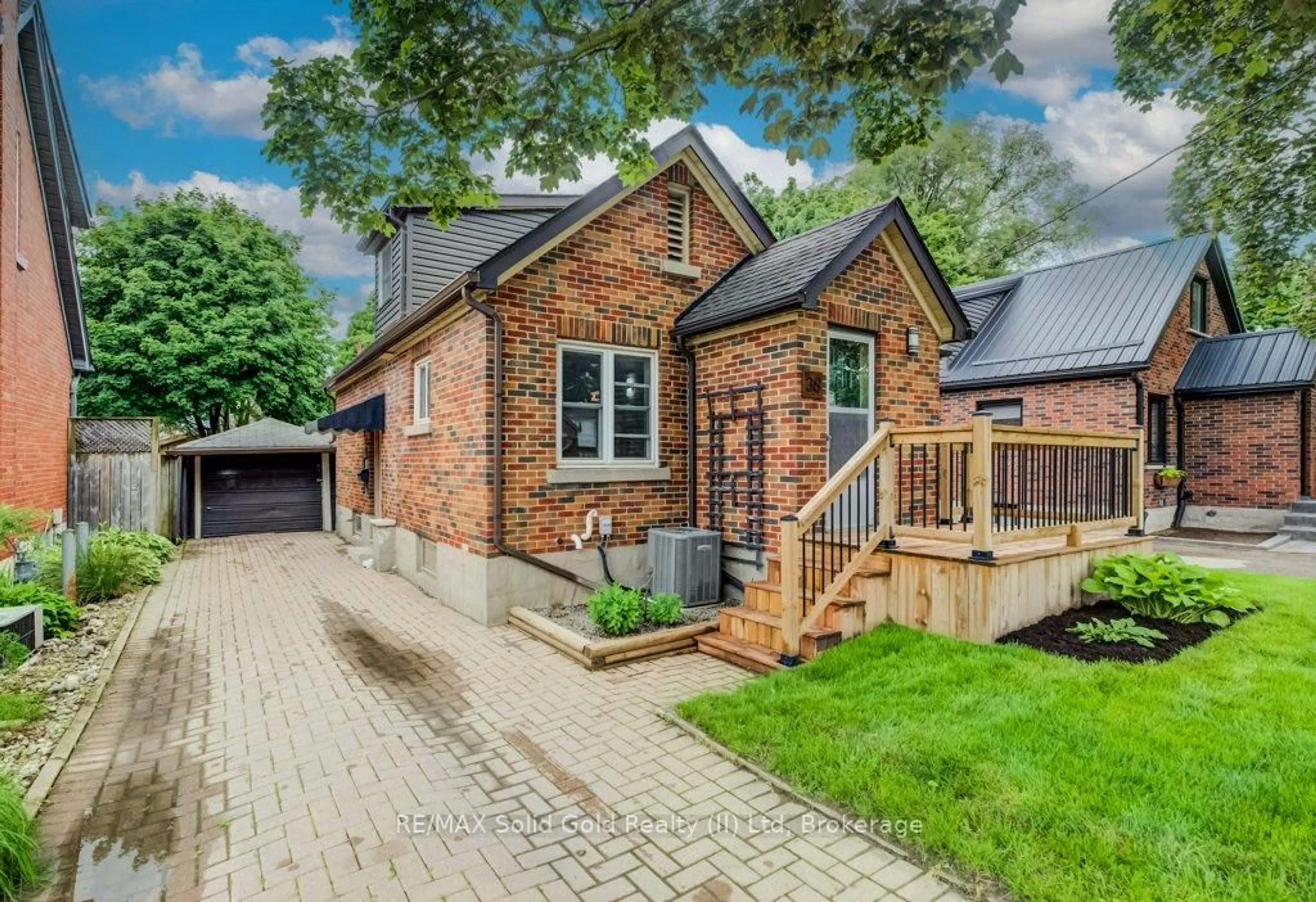 Home with brick exterior material, street for 38 Sydney St, Kitchener Ontario N2H 3L5