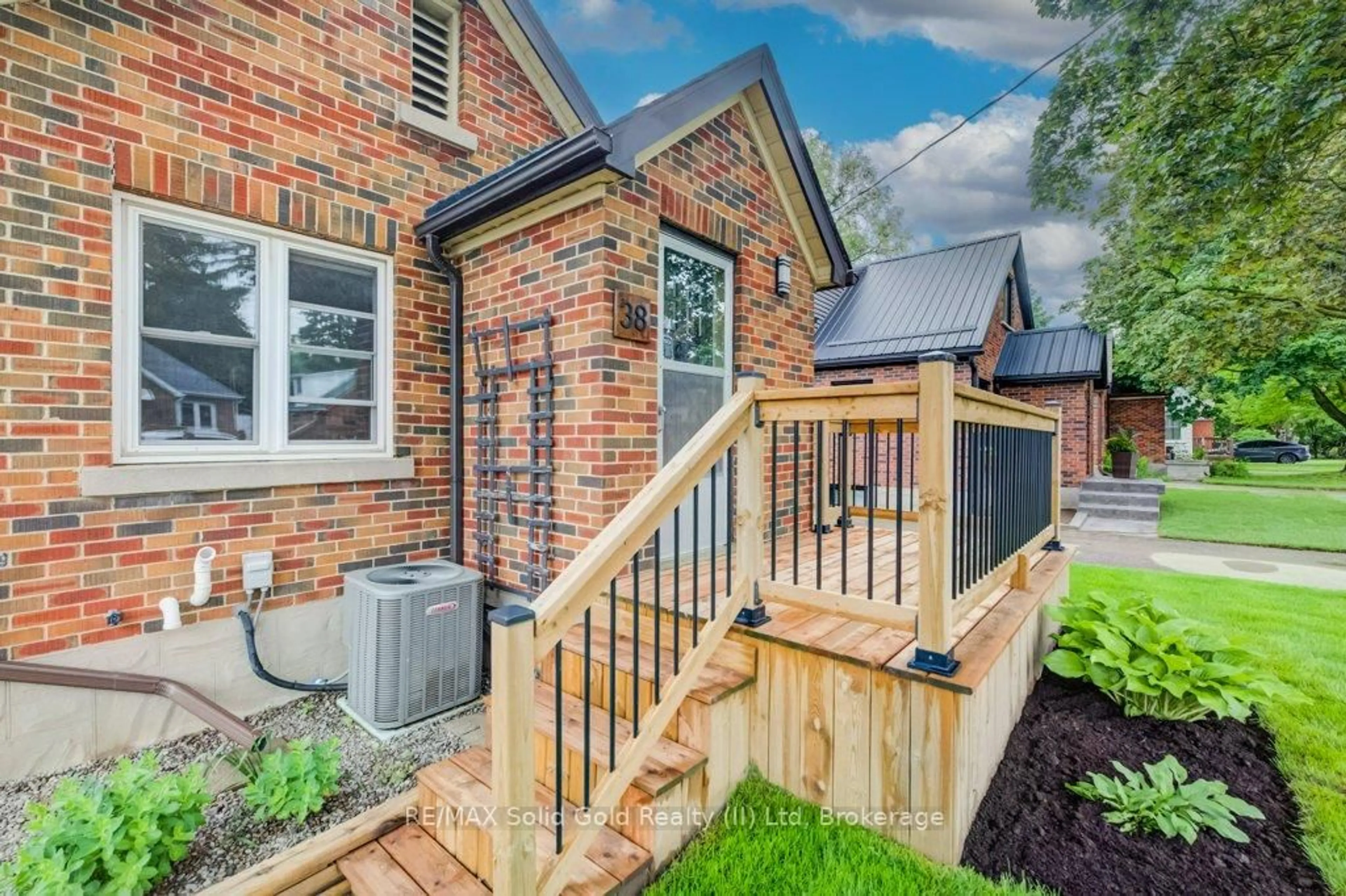 Home with brick exterior material, street for 38 Sydney St, Kitchener Ontario N2H 3L5