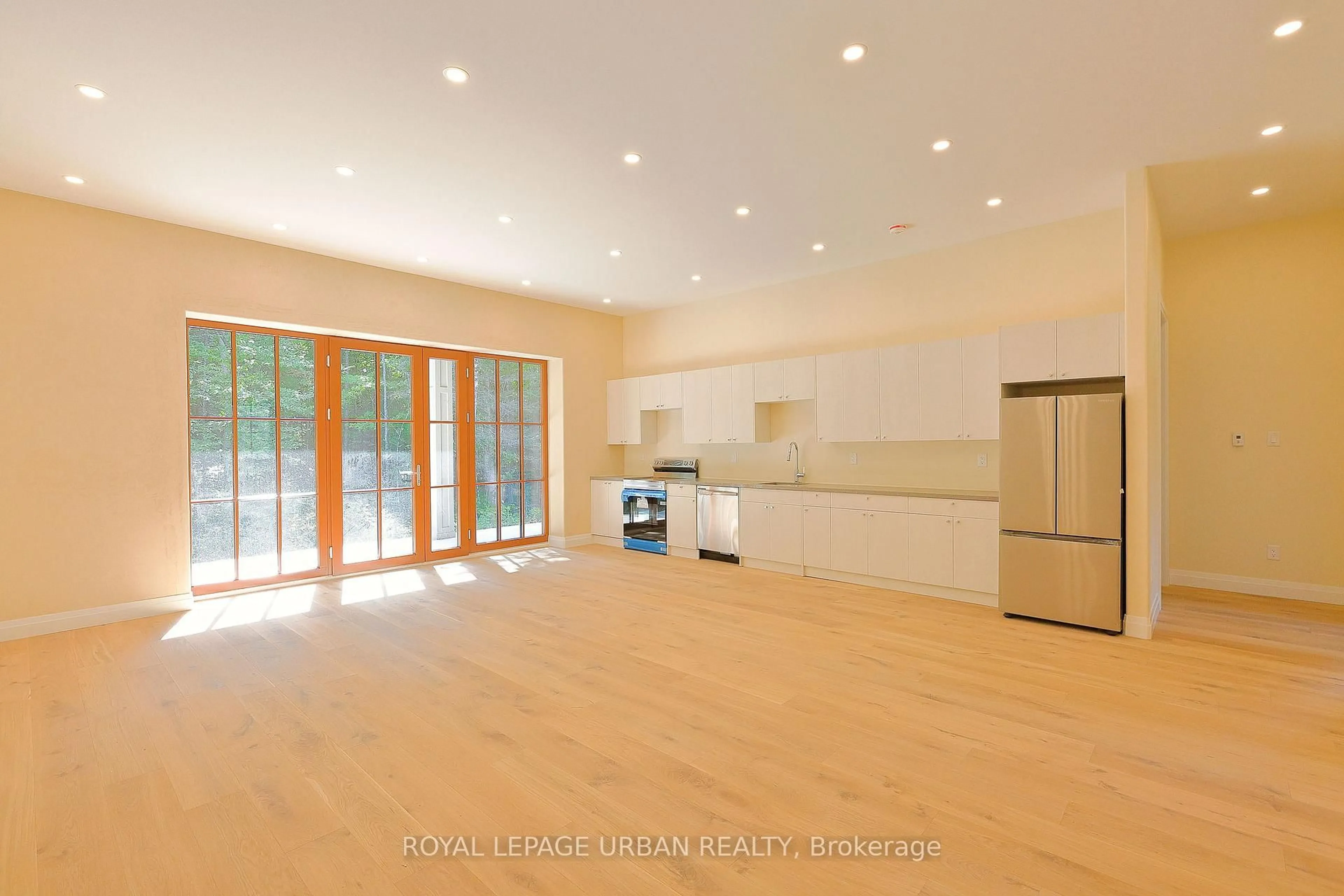 Open concept kitchen, wood/laminate floor for 800 Rye Rd, South River Ontario P0A 1Z0