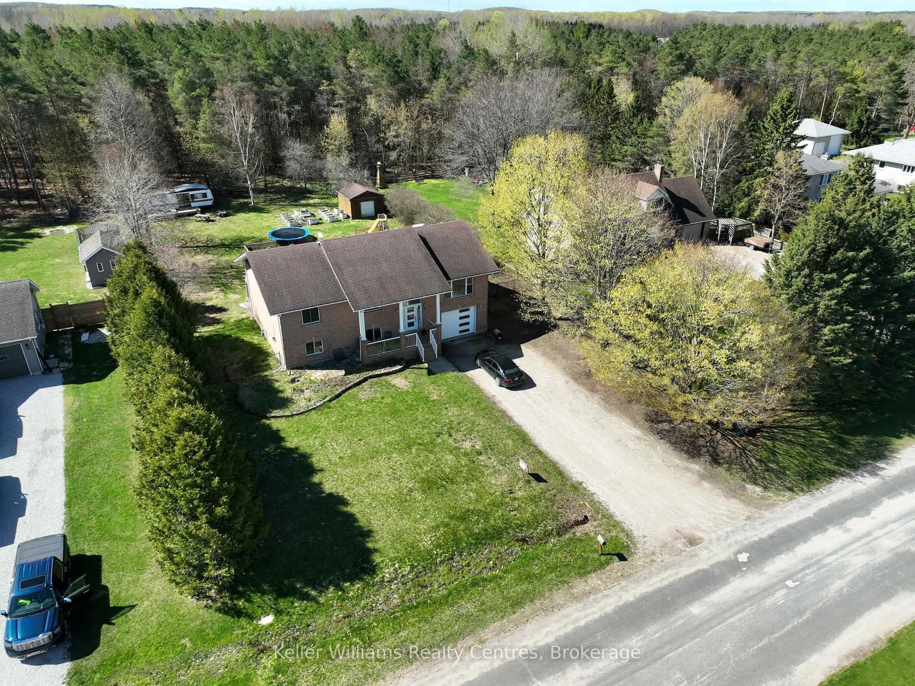 A pic from outside/outdoor area/front of a property/back of a property/a pic from drone, street for 27 Pine Tree Dr, South Bruce Peninsula Ontario N0H 1P0