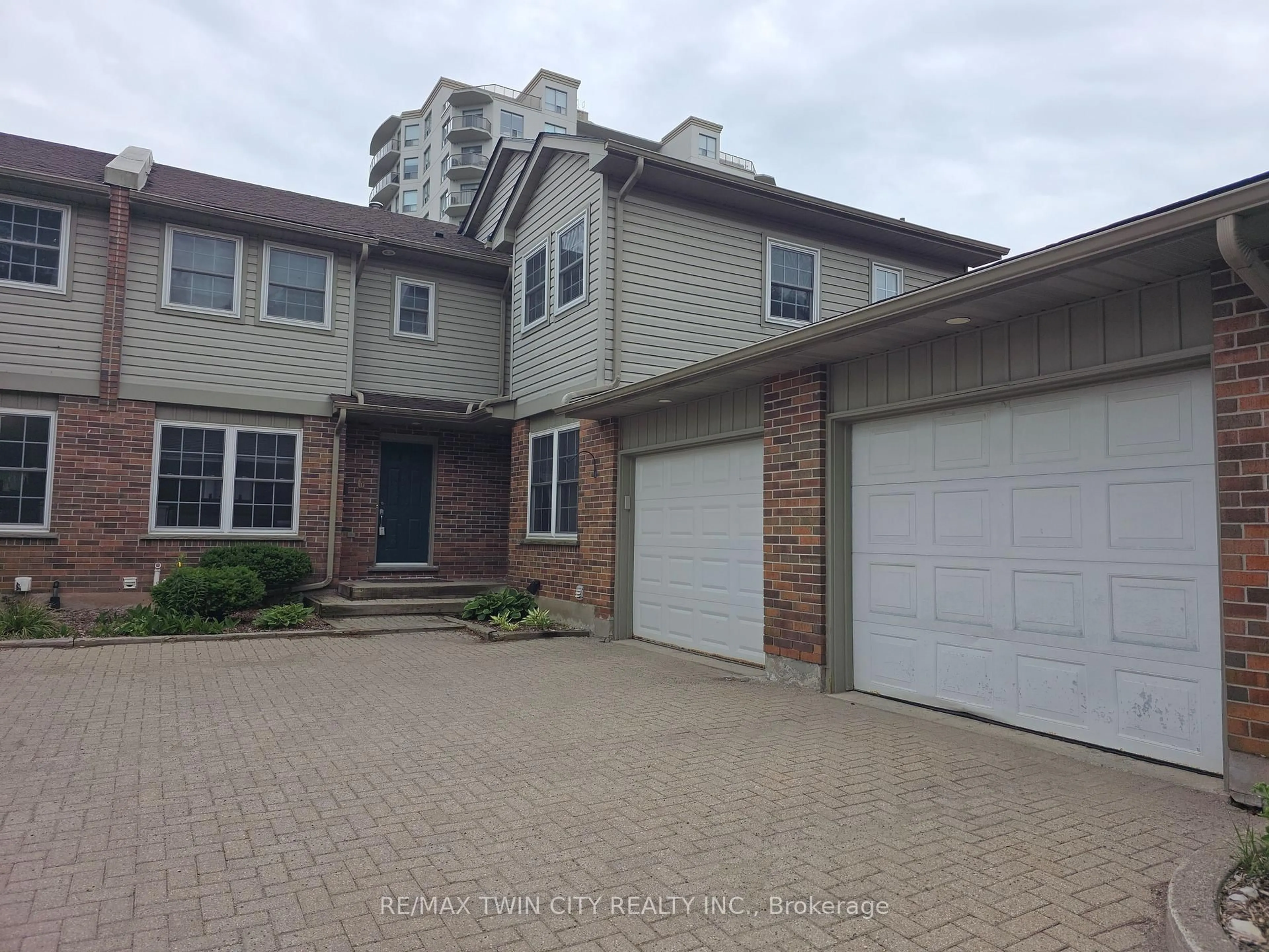 Home with brick exterior material, street for 250 Keats Way #6, Waterloo Ontario N2L 6J5